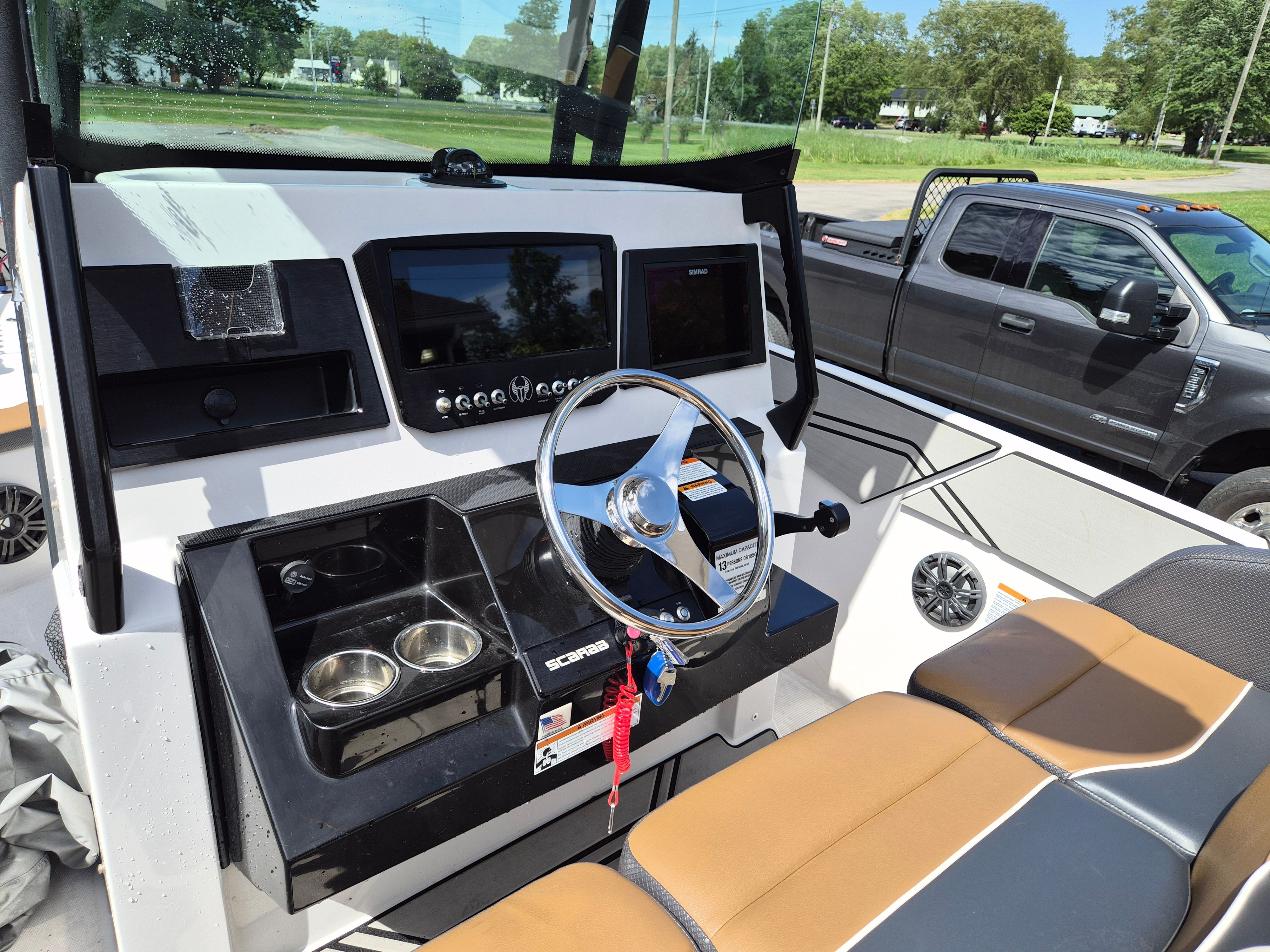 Interior view of a 2019 Scarab 255 Open ID boat.