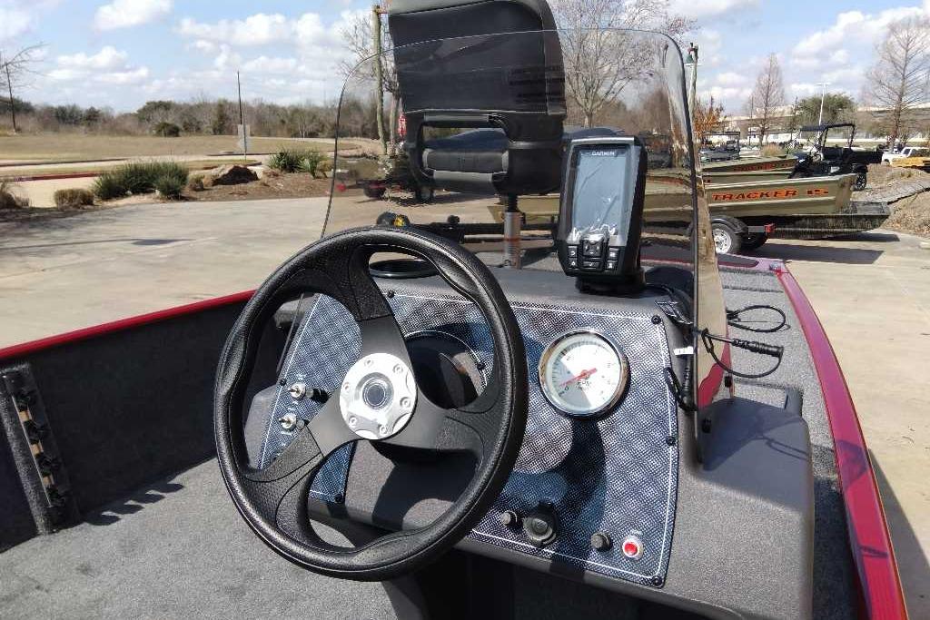 2026 Tracker Bass Tracker Classic XL boat dashboard with steering wheel and navigation system.