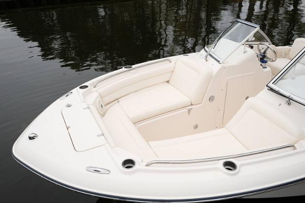 Manufacturer Provided Image: 2019 Grady-White Freedom 215 boat with spacious seating on calm water.