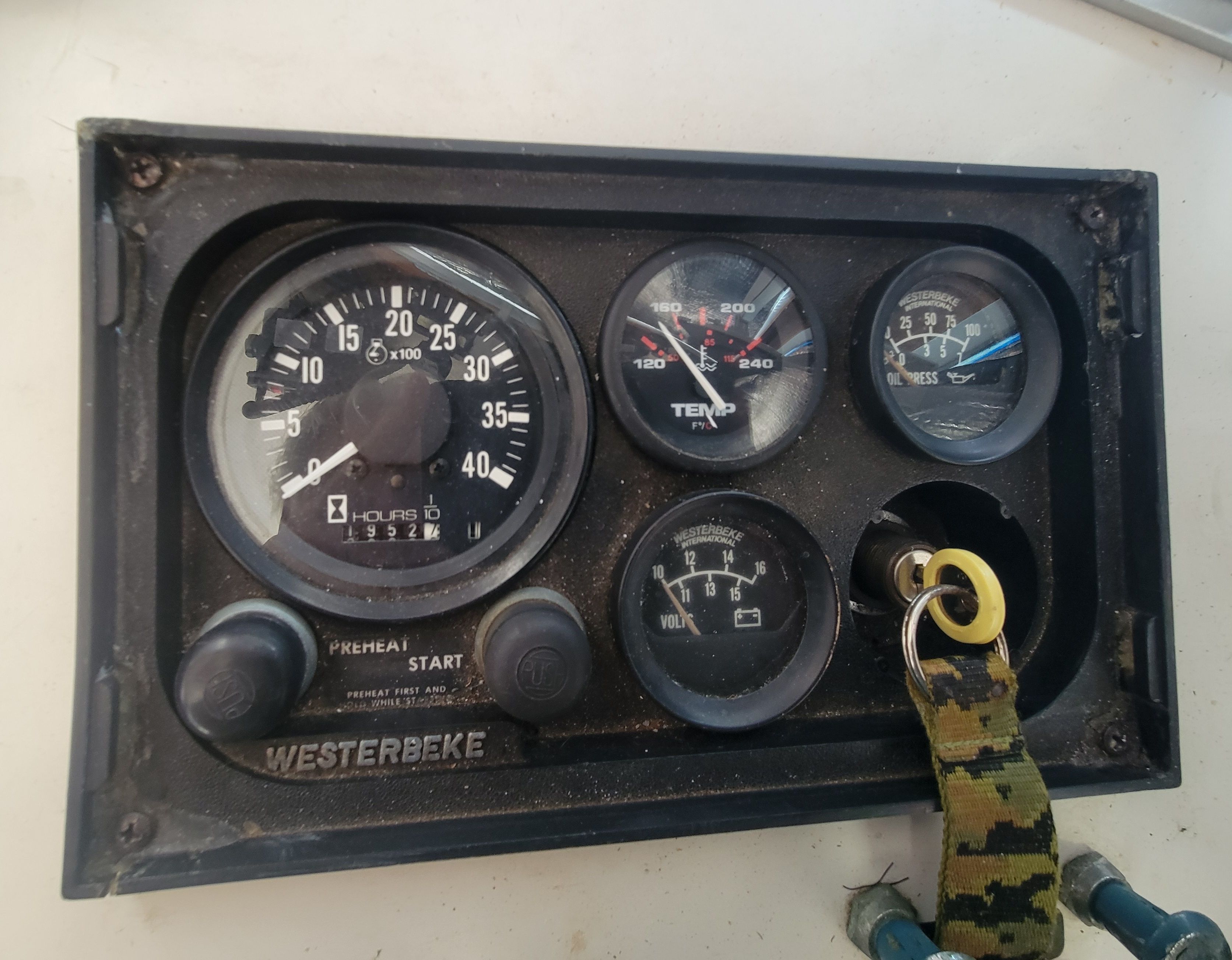 Dashboard of a 1989 Cape Dory MS300 with various gauges and a key switch.