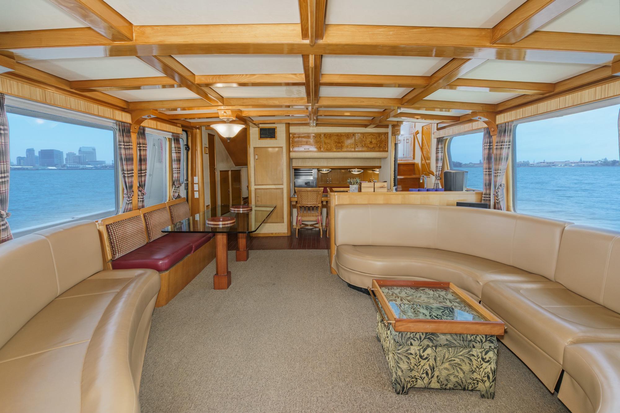 Luxurious interior of a 1990 Seaton Long Range Cruiser with panoramic ocean views.
