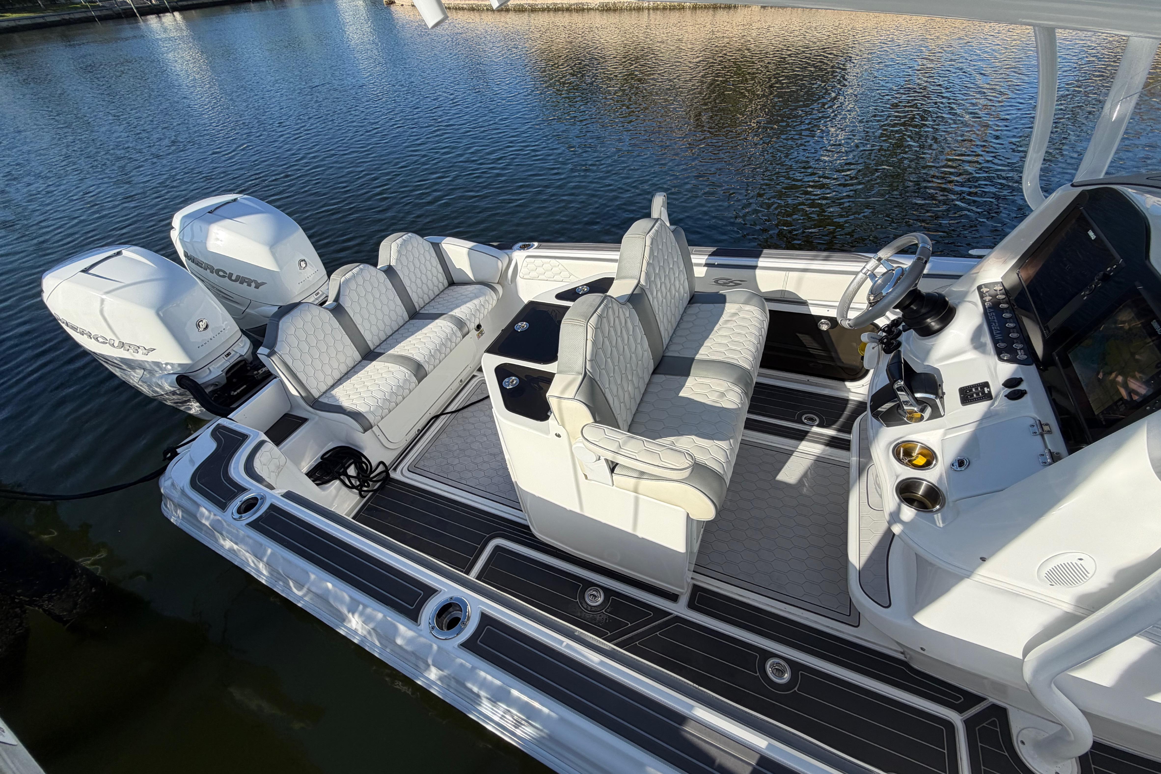 2022 Glasstream 328 Pro-XS boat interior with dual Mercury engines, luxury seating, and modern controls.