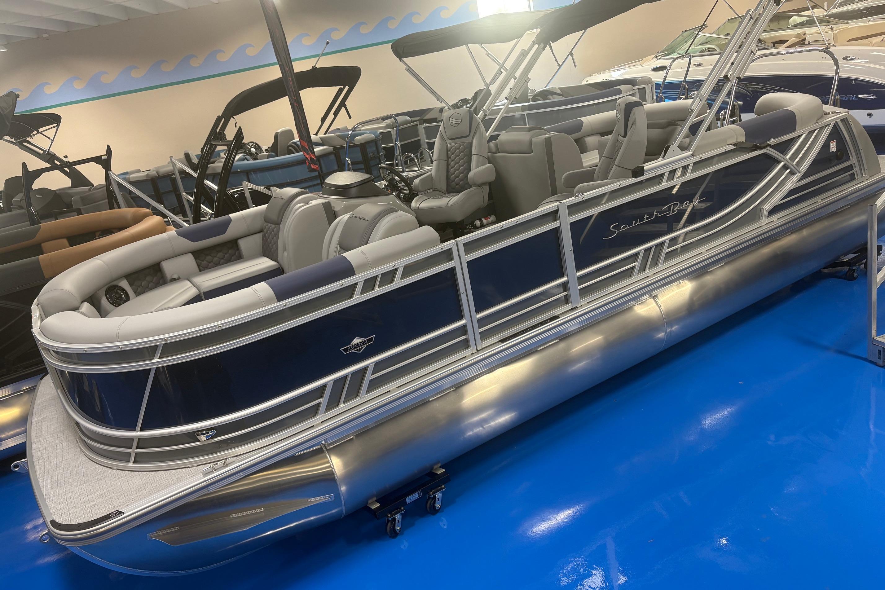 2026 South Bay 523RS pontoon boat with sleek design and luxurious seating.