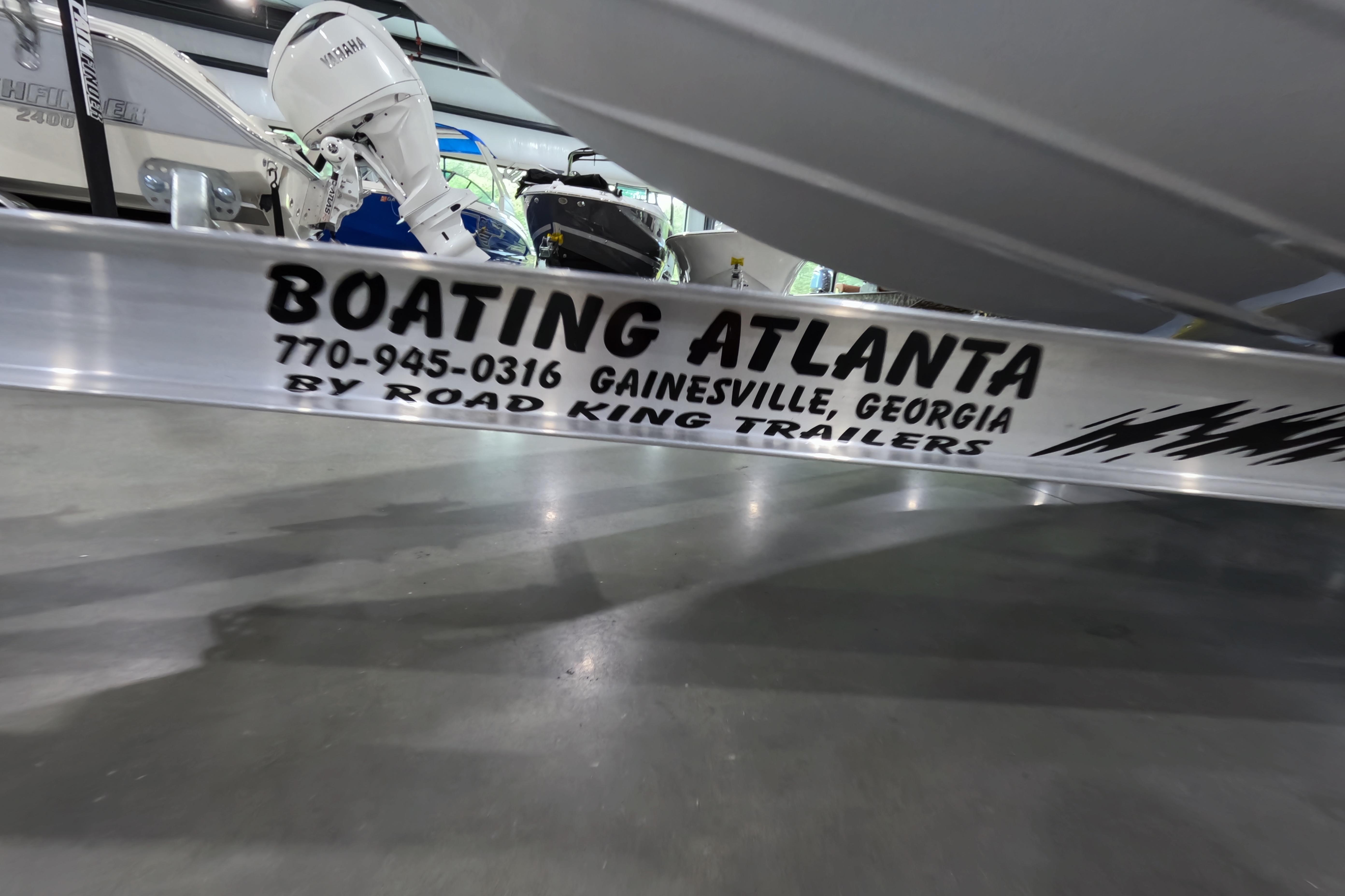 Trailer with "Boating Atlanta" branding, Gainesville, Georgia, for Skeeter SX230, 2026 model.