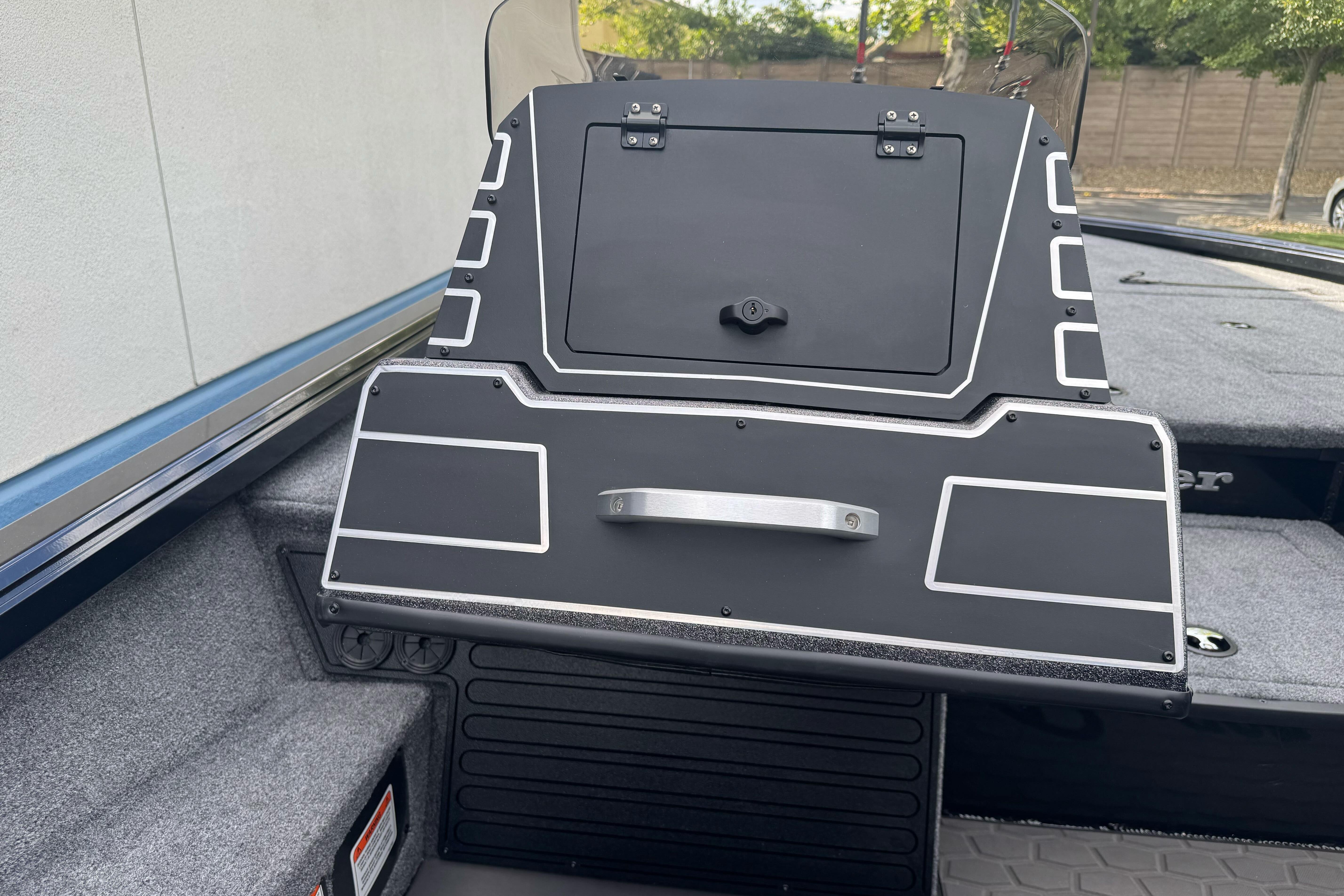 2026 Ranger ALPHA 208 boat console with sleek black design and modern features.