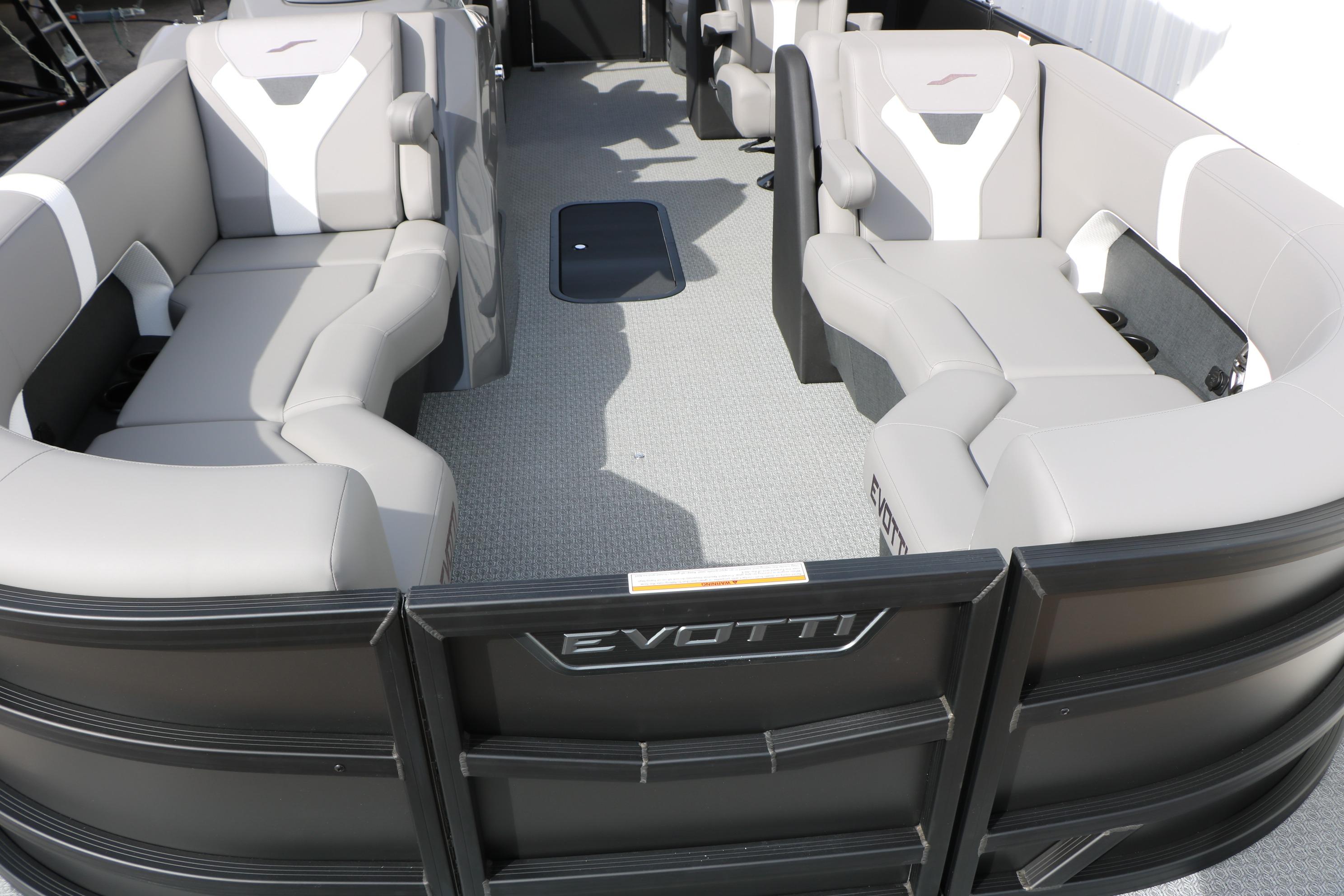 Luxurious seating on 2026 Evotti 521QL pontoon boat, featuring modern design and comfort.