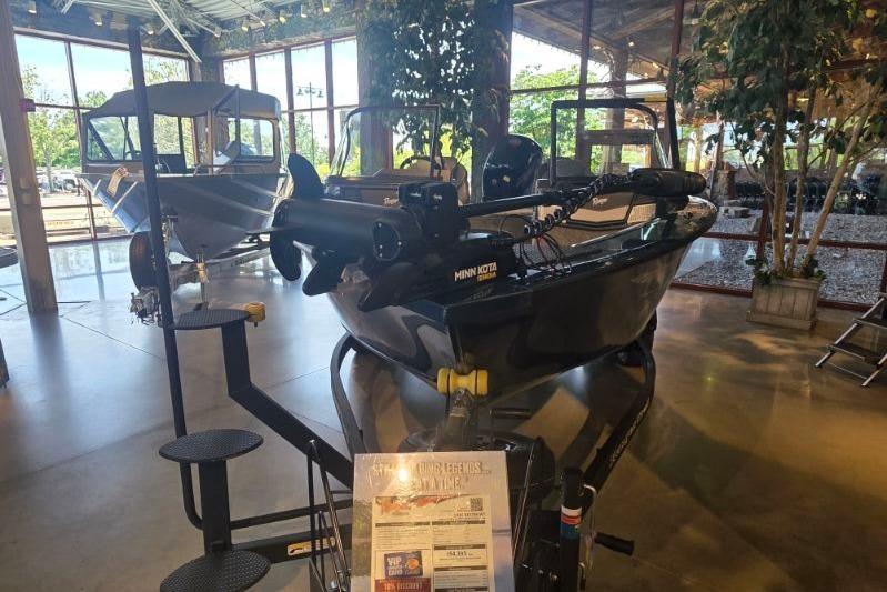 2026 Ranger VX1788 WT boat displayed indoors with Minn Kota trolling motor.