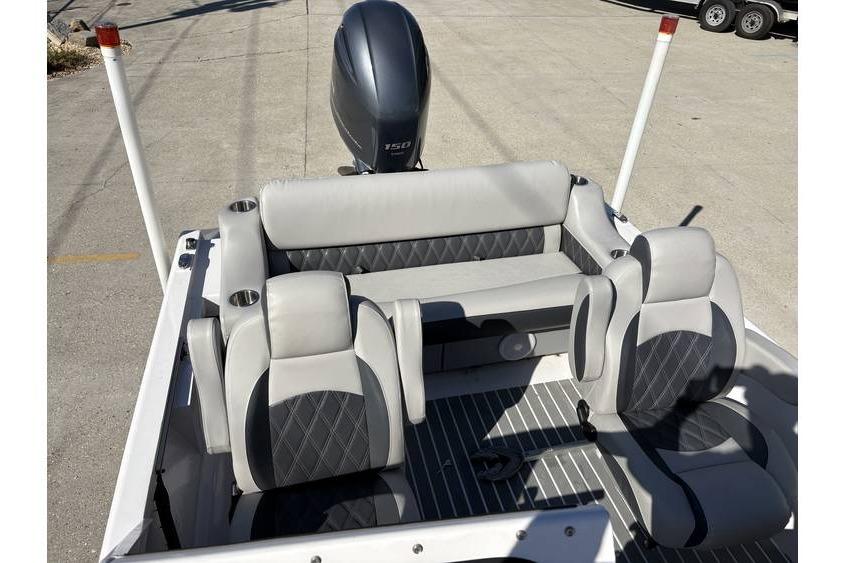 Interior of 1997 Scully's 18 WT boat with modern seating and motor.