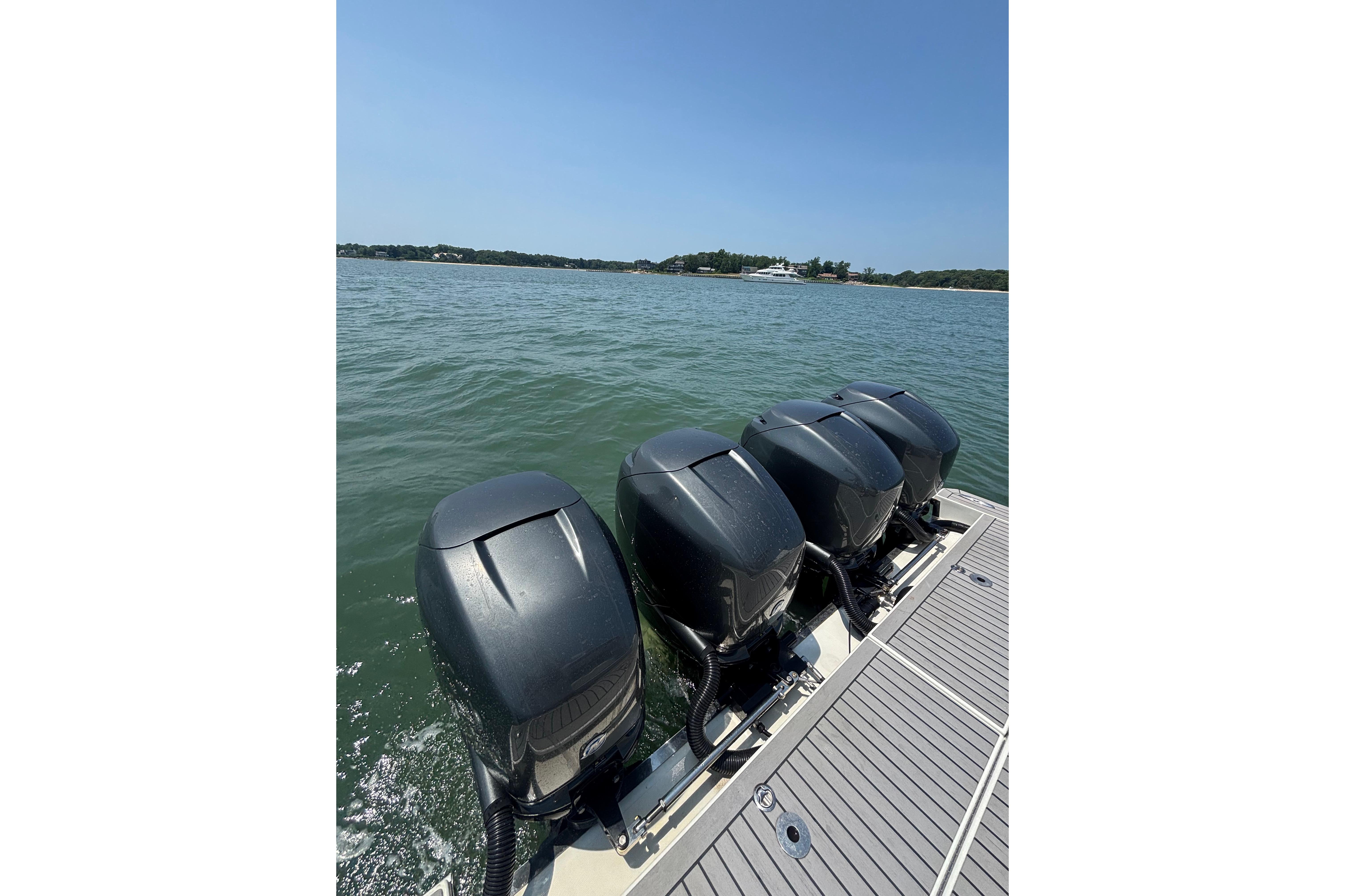 Four powerful outboard motors on a 2019 Formula 430 Super Sport Crossover boat.