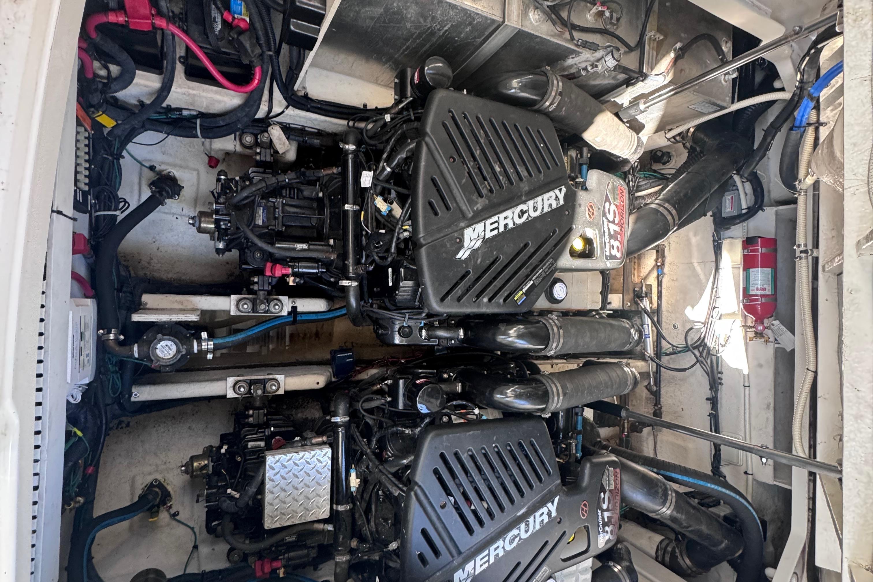 Engine compartment of a 2008 Sea Ray 350 Sundancer with twin Mercury engines.