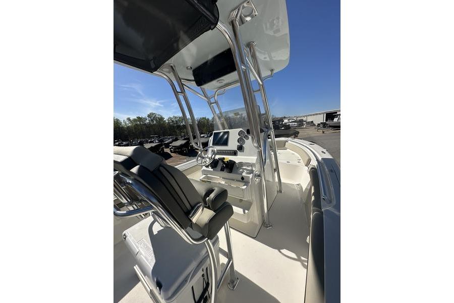 2026 Key West 219 FS boat interior with modern helm and seating.