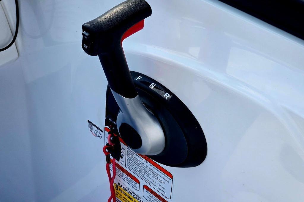 Throttle control lever on a 2018 Tahoe 450 TS boat.