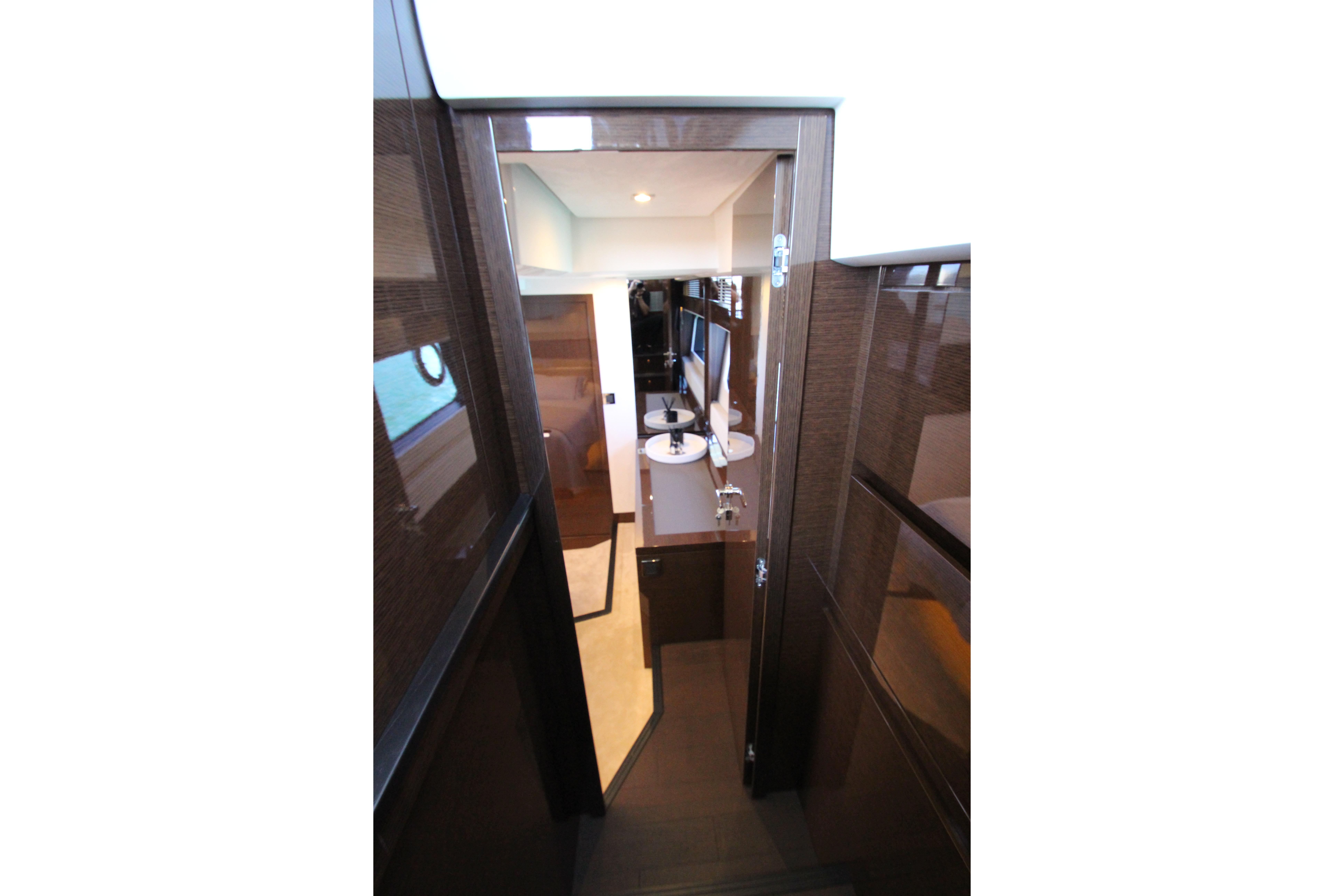 Interior view of 2022 Prestige 520 yacht, showcasing modern design and luxurious finishes.