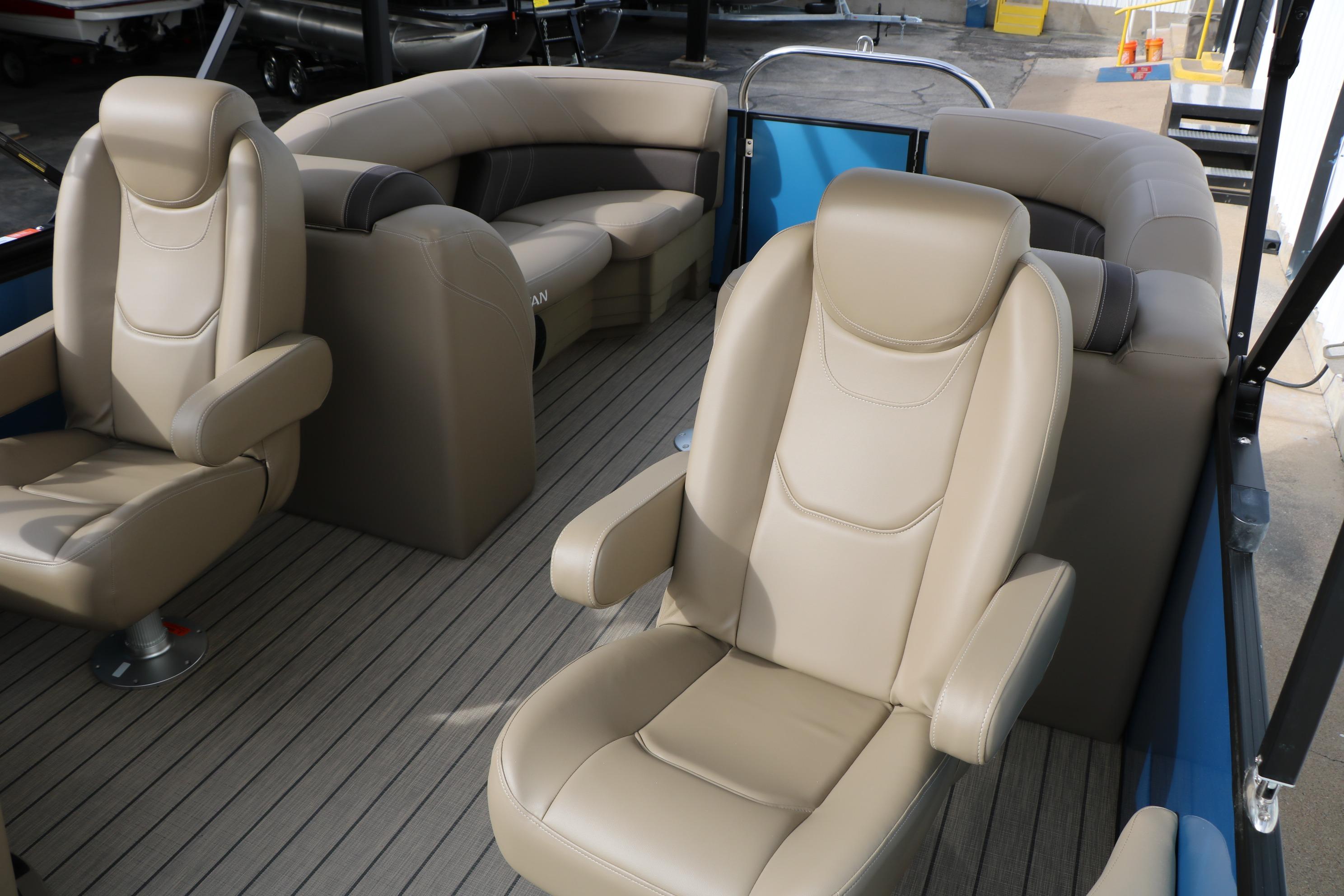 Luxurious seating on 2026 Sylvan Mirage 822 LZ pontoon boat, featuring beige leather upholstery.