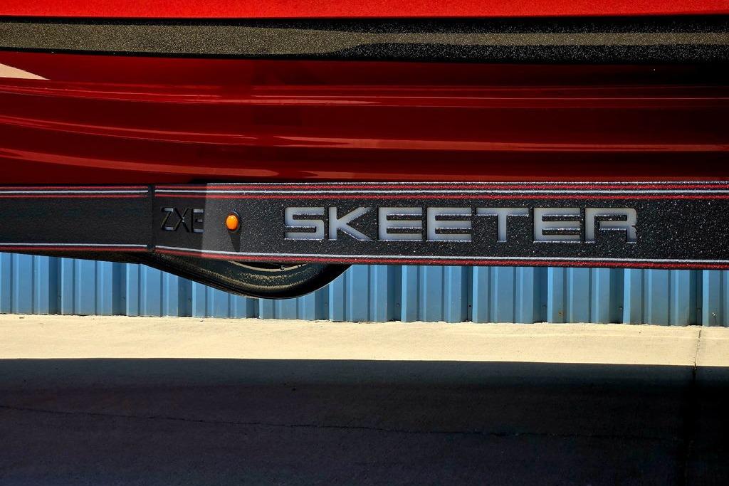 2026 Skeeter ZXE20 boat trailer with red and black design.