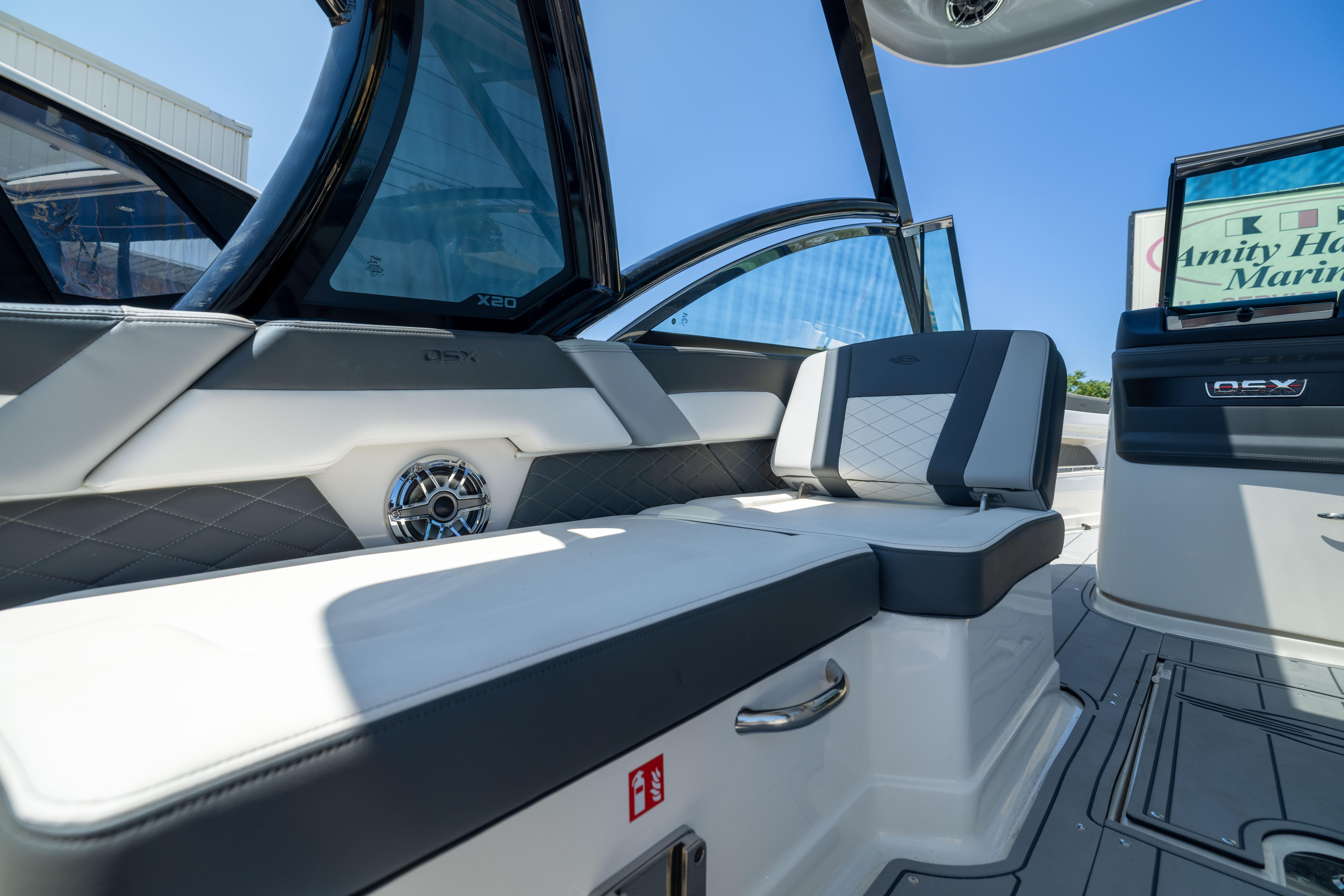 Interior of 2026 Chaparral 310 OSX boat, featuring luxurious seating and modern design elements.