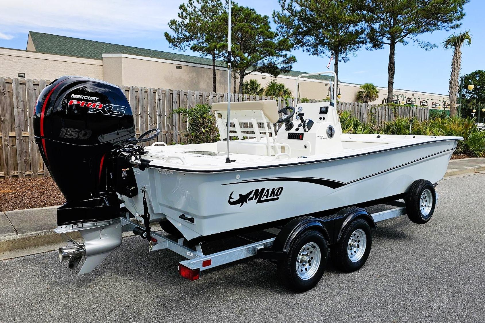 2026 Mako Pro Skiff 19 CC boat with Mercury engine on trailer.