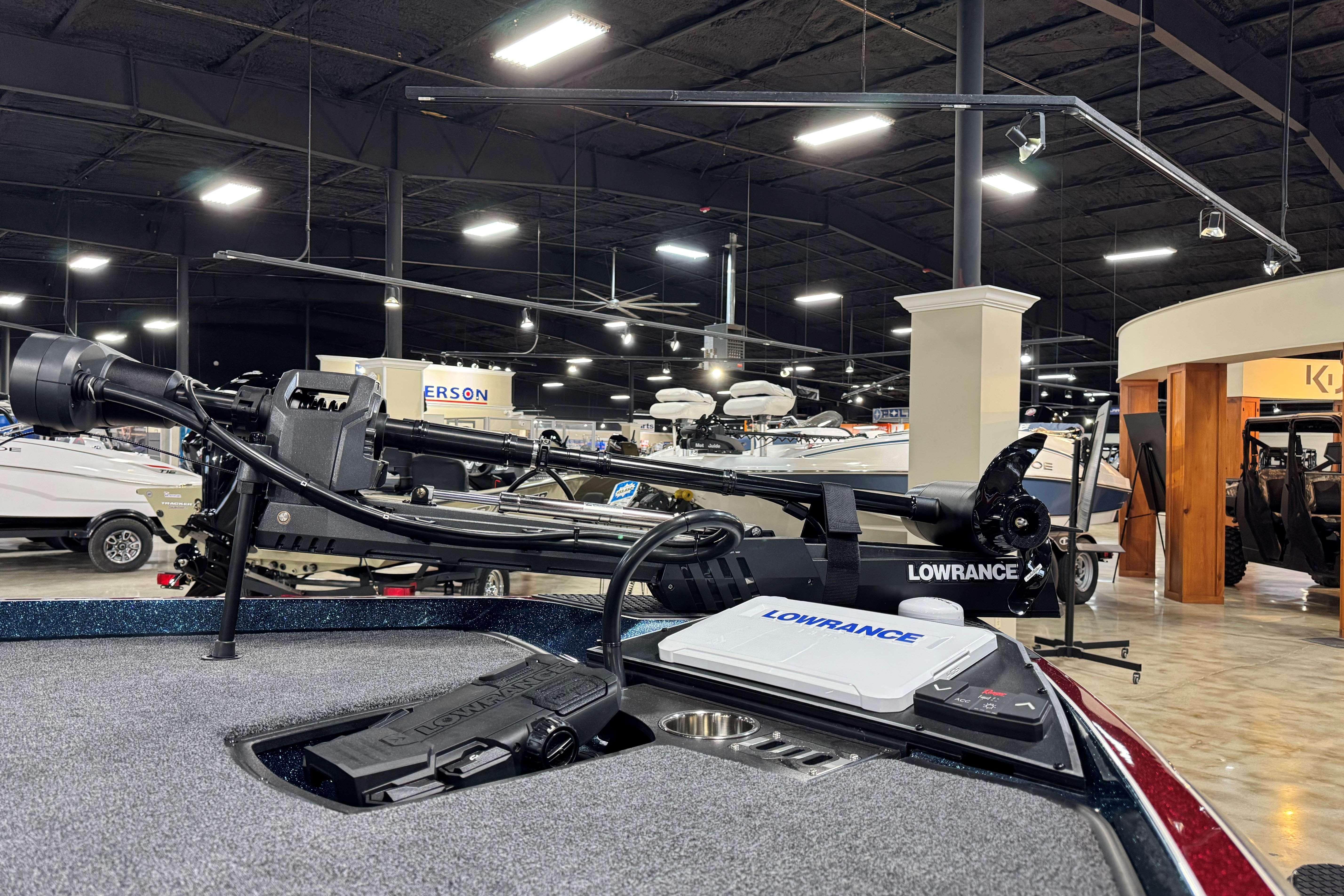 2025 Ranger Z520R Cup-Equipped boat with Lowrance equipment in showroom setting.