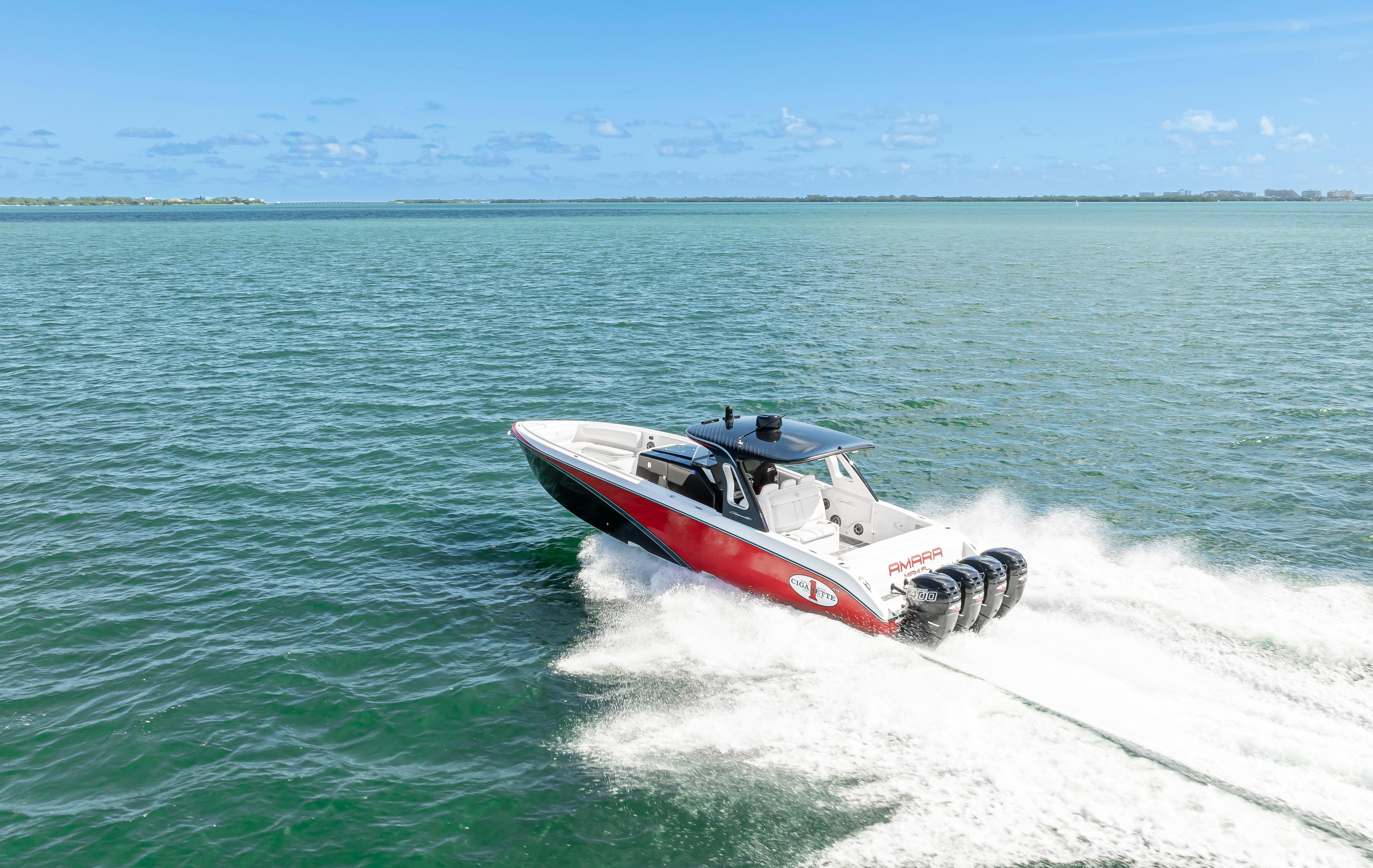 2016 Cigarette 41' GTR speedboat cruising on the sea.