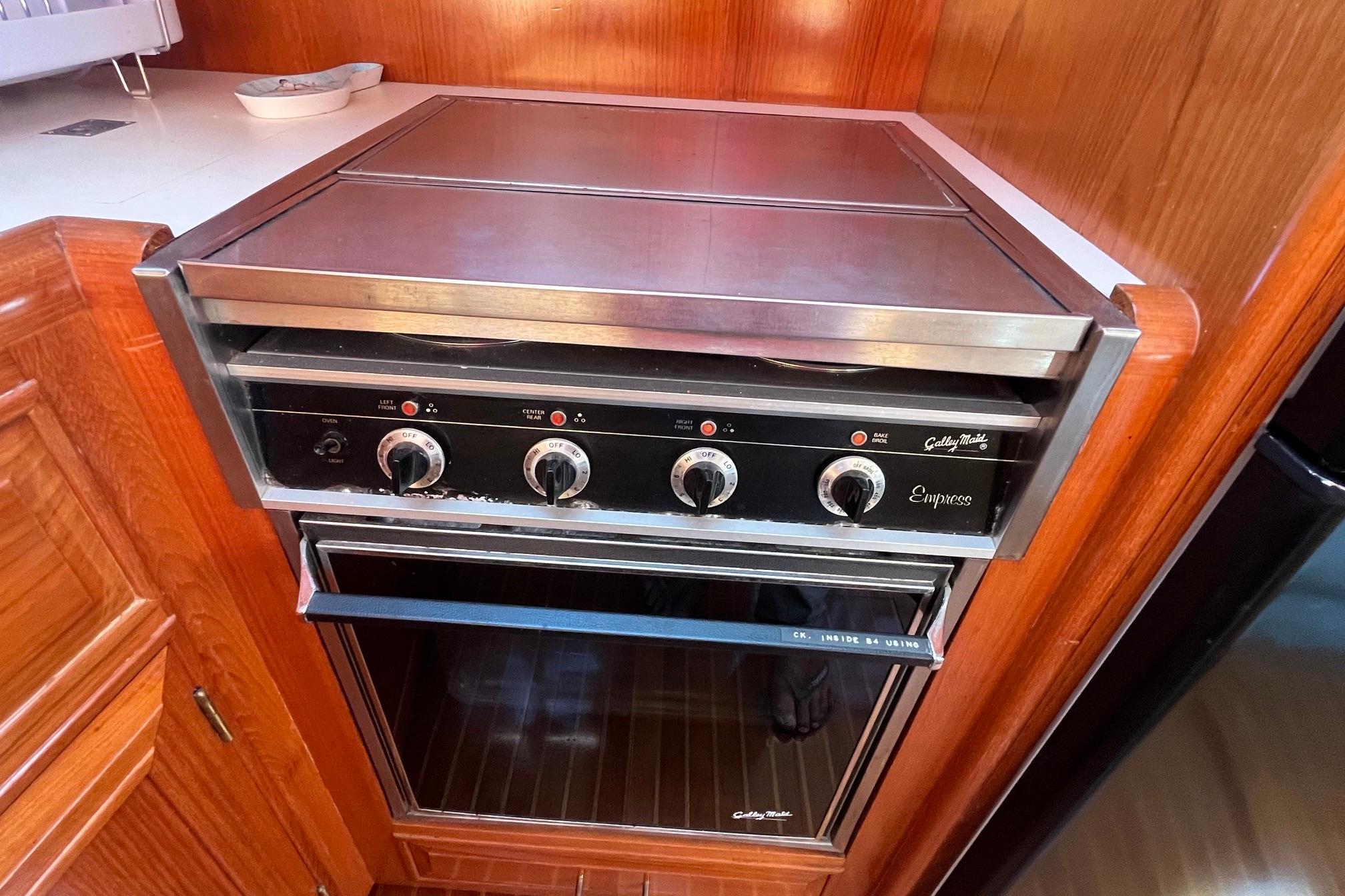 Galley Maid Empress stove in 1989 Ocean Alexander 440 Sundeck CPMY yacht kitchen.