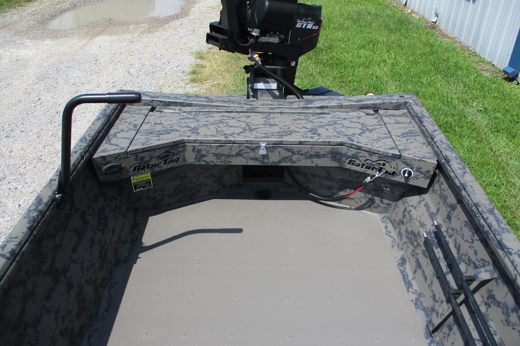 2026 Gator Tail 1754 Extreme boat interior with camouflage design and motor.