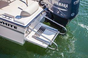 2026 Grady-White Fisherman 180 boat with Yamaha engine, featuring a swim platform and ladder.