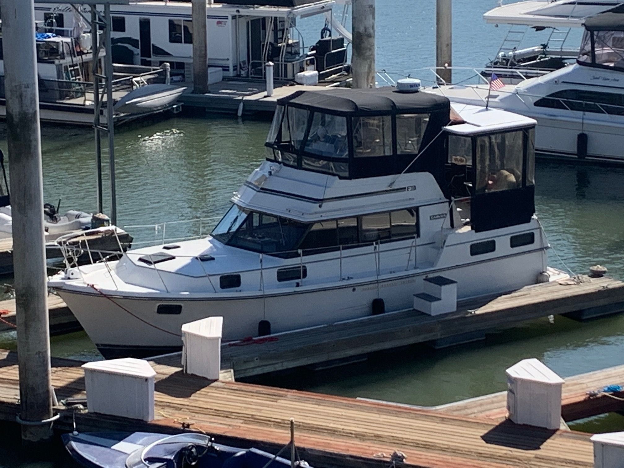 A 1988 Carver 3607 Aft Cabin Motor Yacht docked in the water.