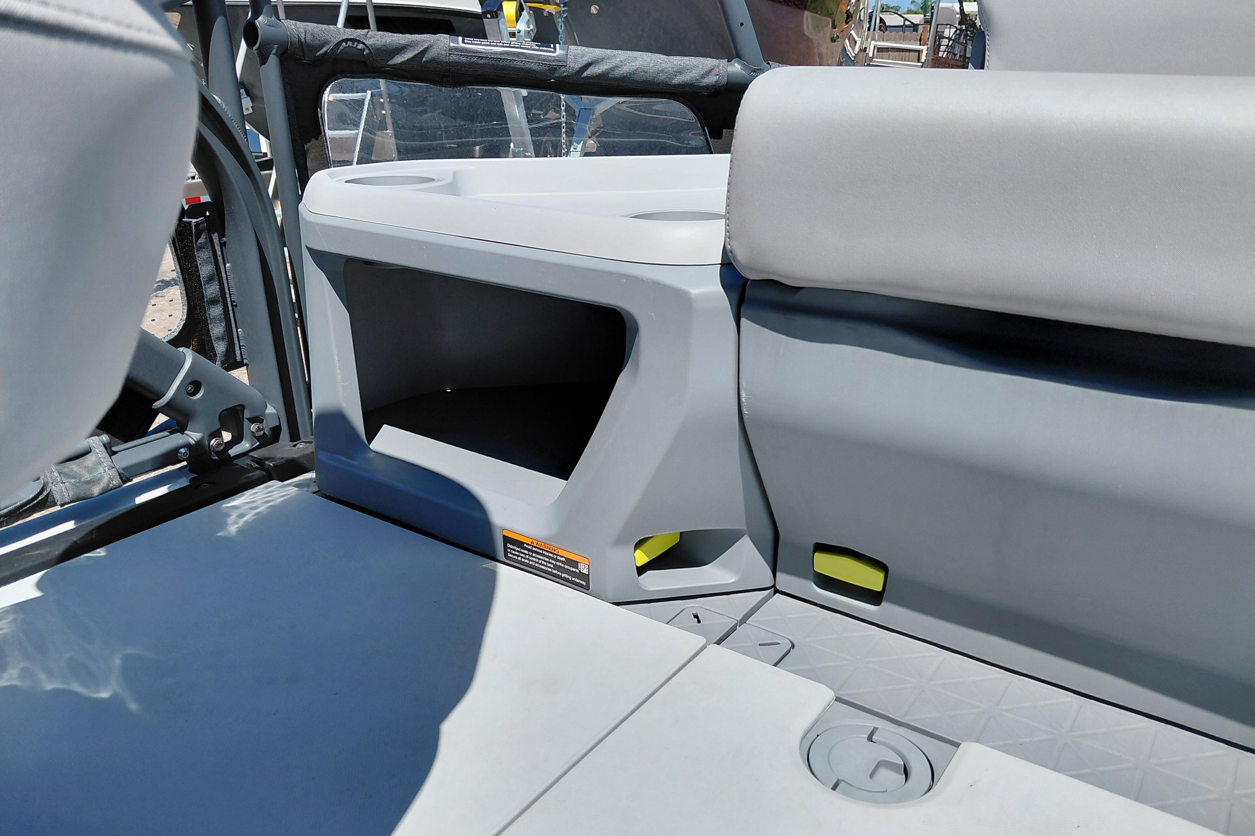 Interior seating and storage of 2024 Sea-Doo Switch Cruise 18 boat.