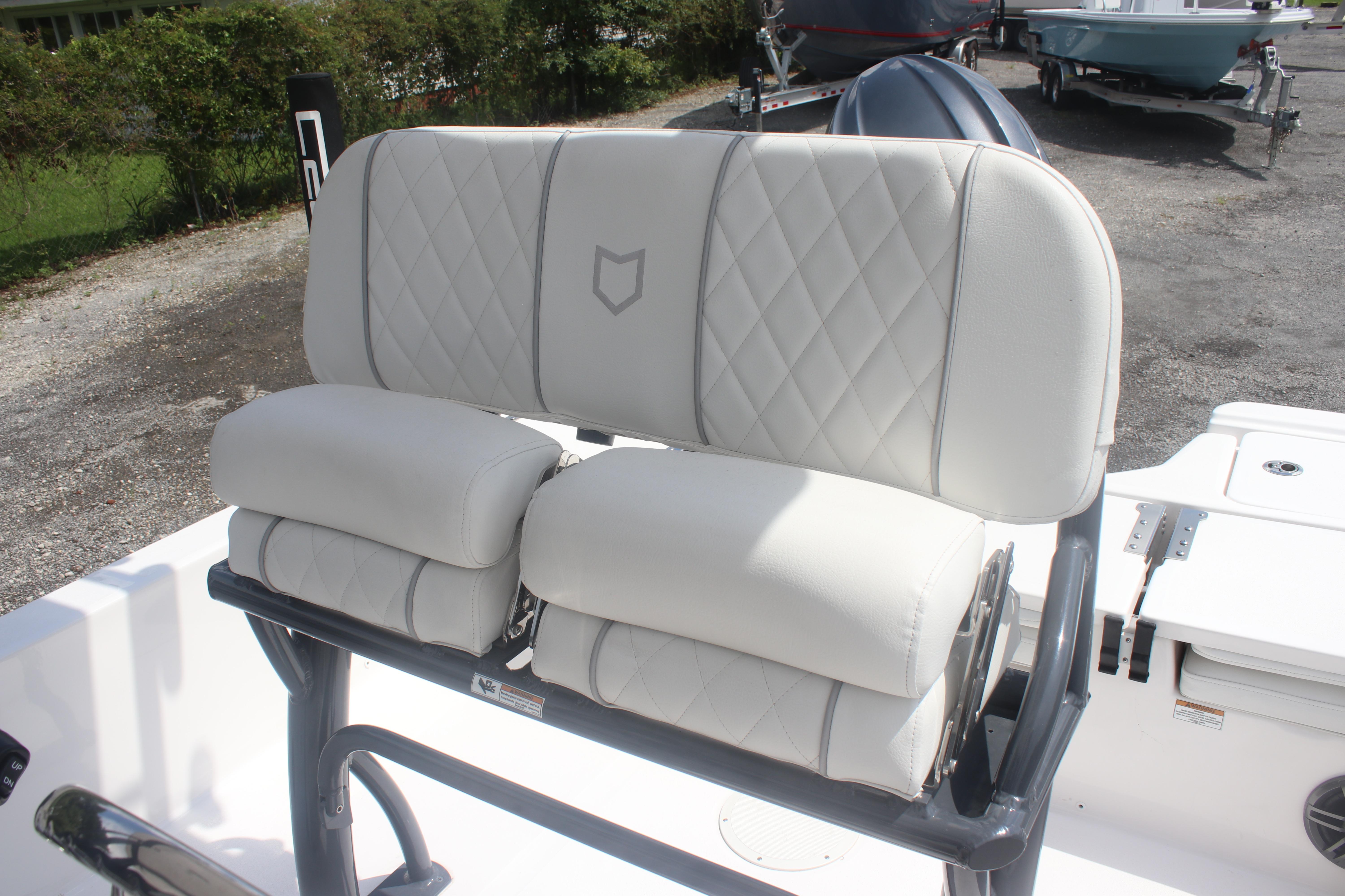 2025 Sea Fox 231 Bay Fox boat seat with diamond-stitched upholstery, outdoor setting.