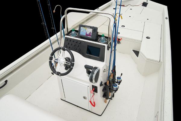 Manufacturer Provided Image: Manufacturer Provided Image: 2025 Ranger RB210 boat console with steering wheel, fishing rods, and navigation system.