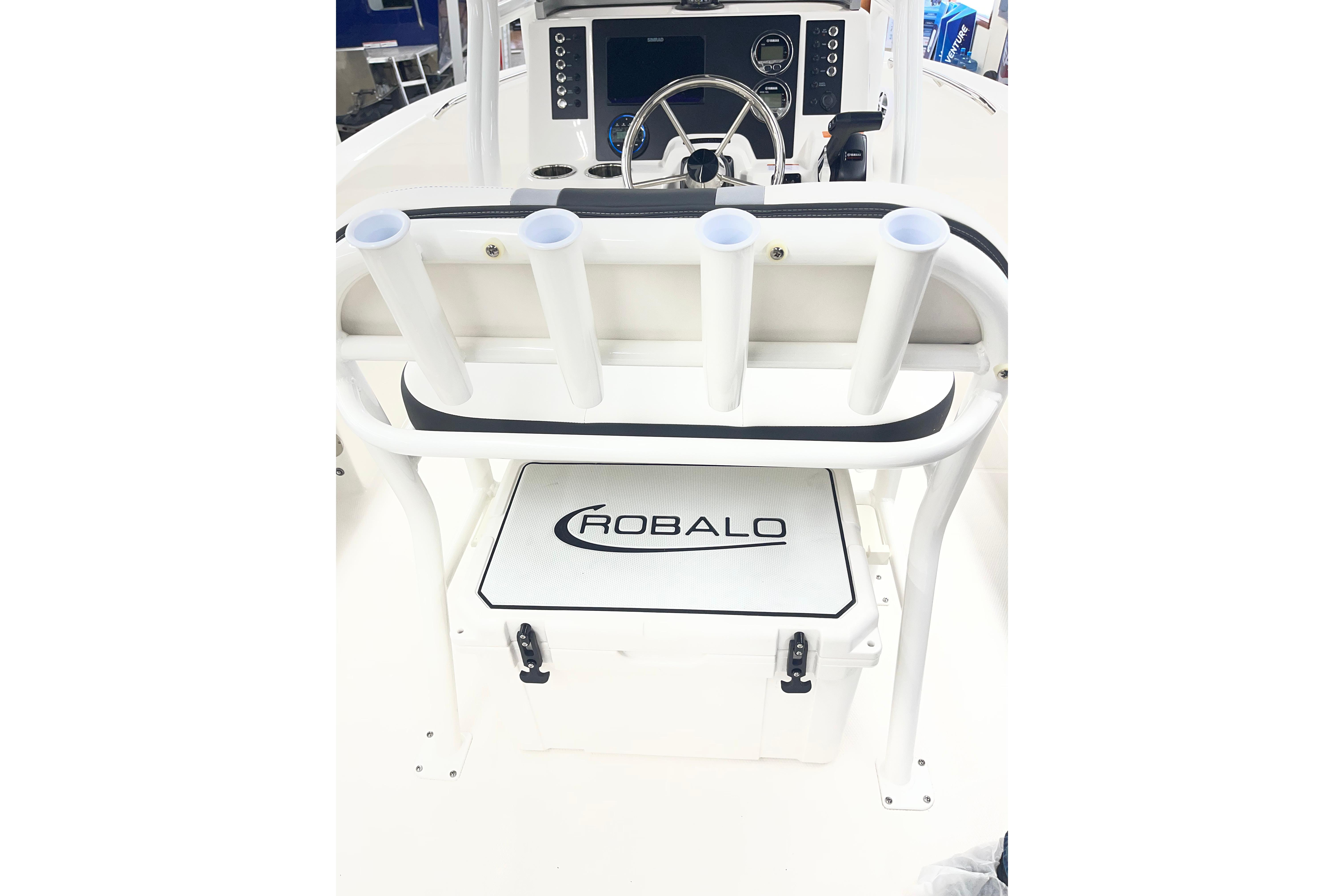 2026 Robalo R180 Center Console boat interior with rod holders and branded cooler.