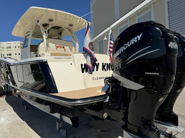 2022 Scout 330 LXF boat with twin Mercury 400 Verado engines.