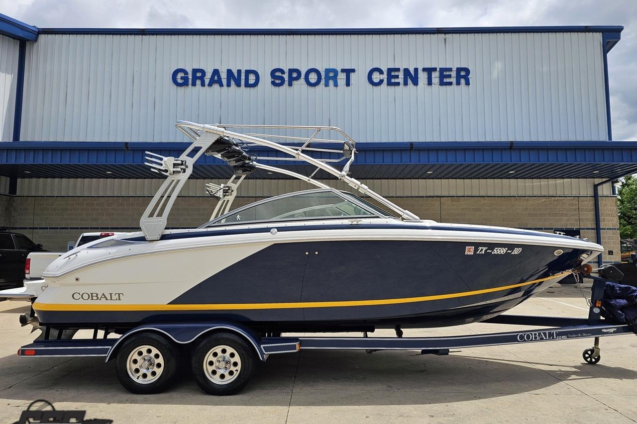 2010 Cobalt 232 WSS boat on trailer at Grand Sport Center.