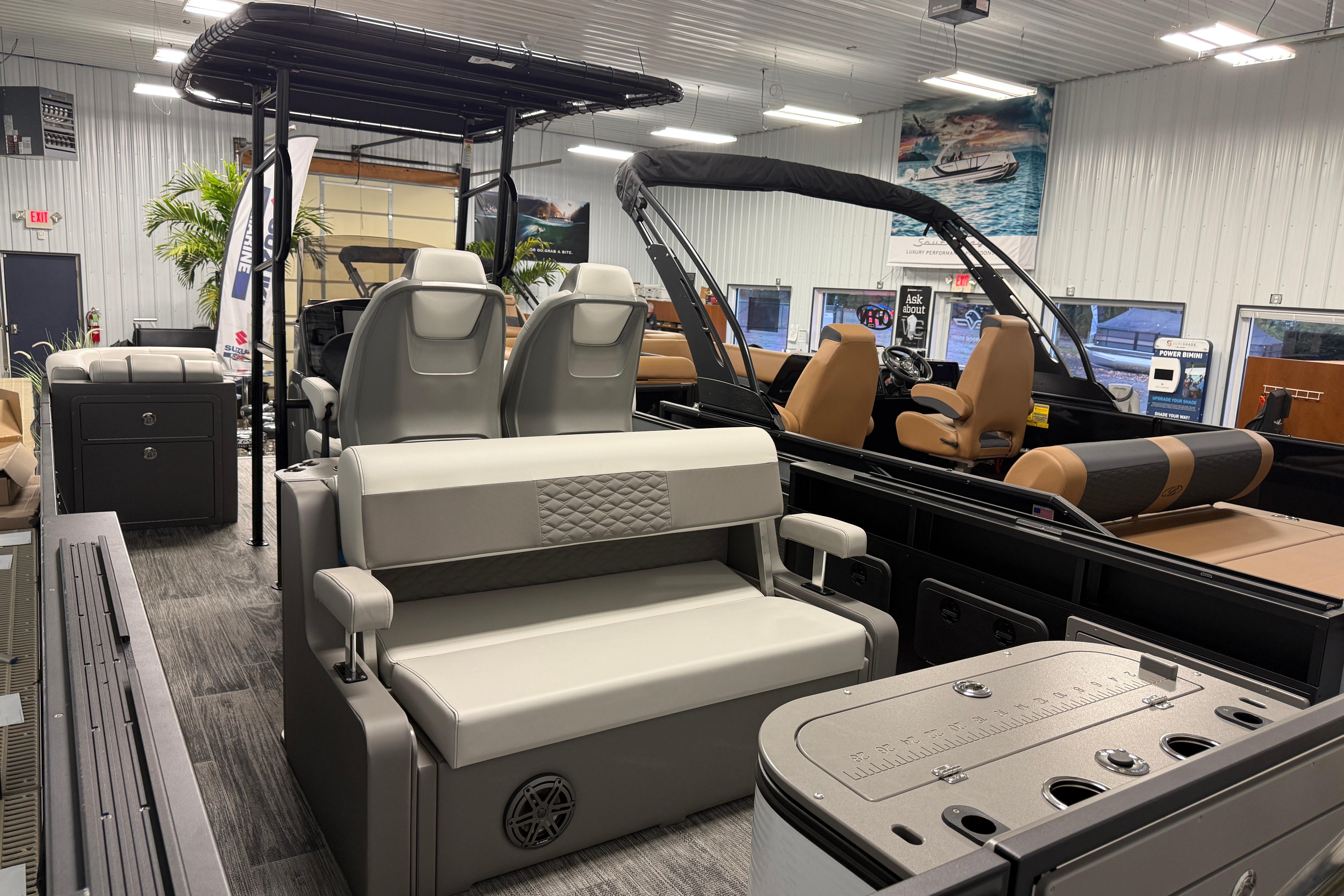 2026 Qwest M-Class 22 Pro Sport boat interior with modern seating and controls.
