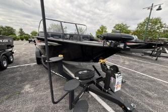 2026 Tracker Targa V-18 Combo boat on trailer in parking lot.