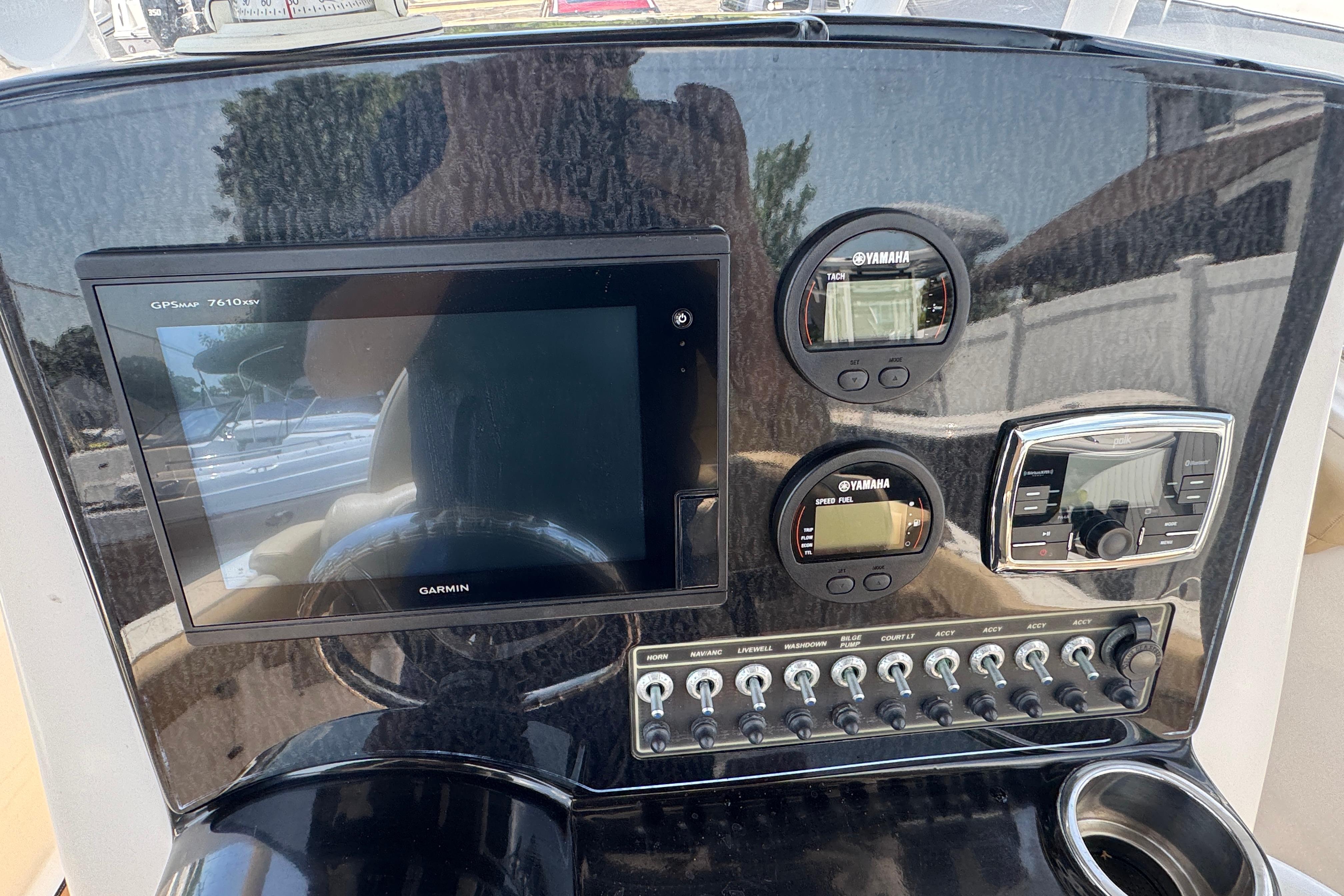 Control panel of a 2016 Tidewater 230 LXF boat with Garmin GPS and Yamaha gauges.