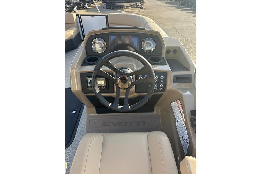 2026 Evotti 523CS boat dashboard with steering wheel and control panel.