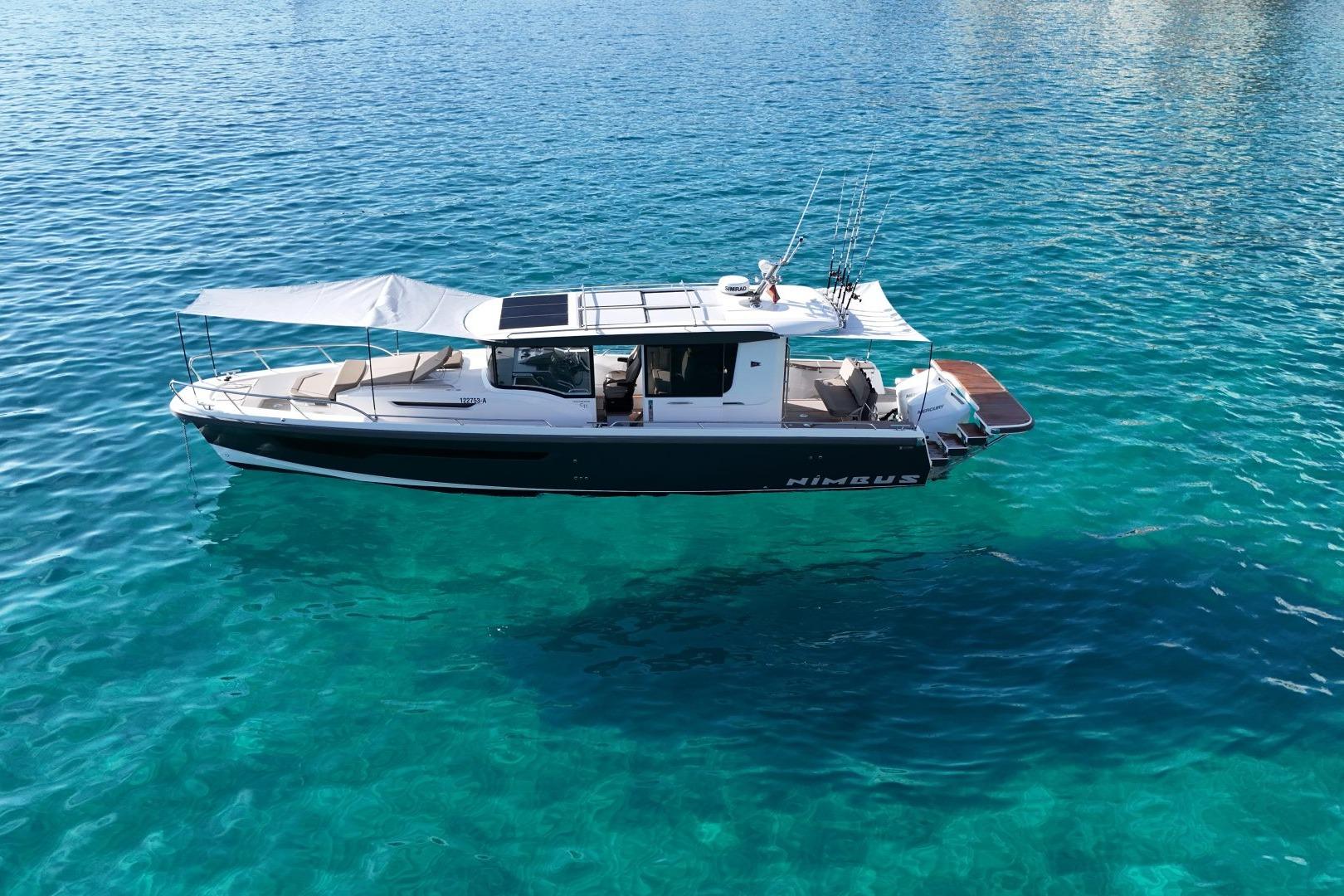 Nimbus Commuter 11 boat 2025 on clear water.