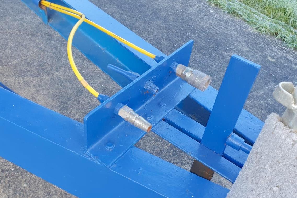 Blue metal frame with yellow cables, part of a 1989 Fairey Spearfish MKIII.