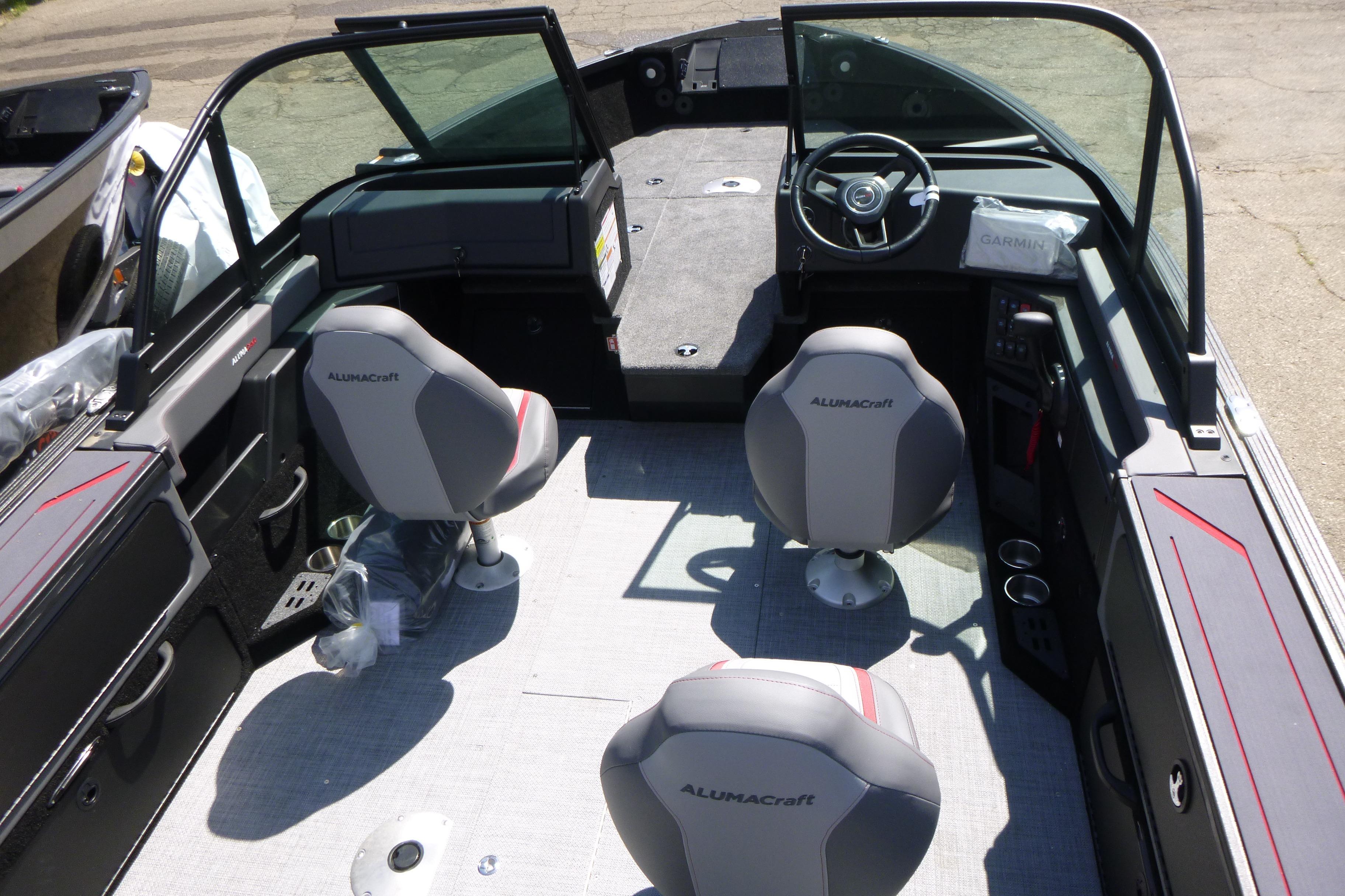 2025 Alumacraft Trophy 185X Sport boat interior with seating and steering console.