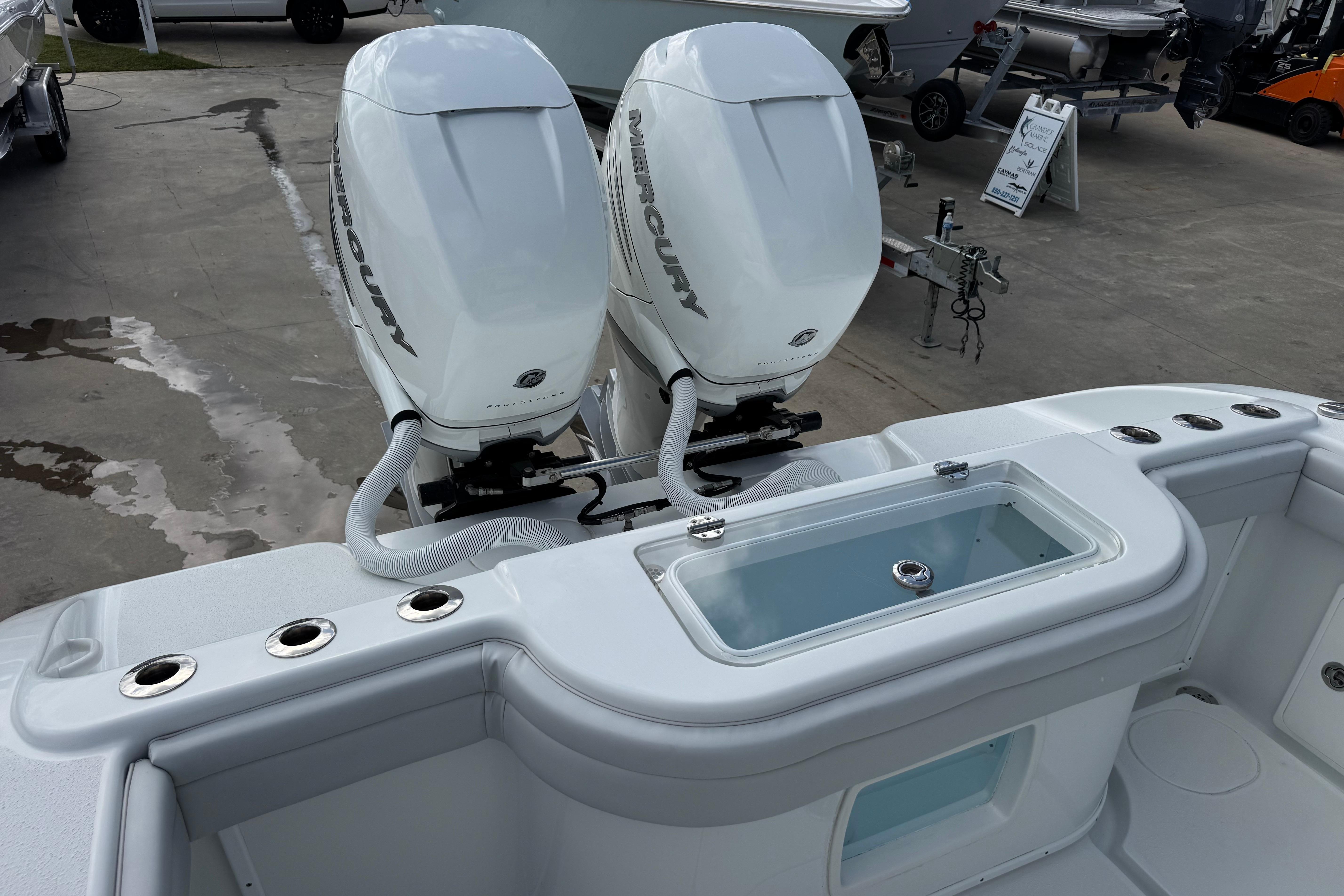 2022 Yellowfin 32 Offshore boat with dual Mercury engines and livewell.