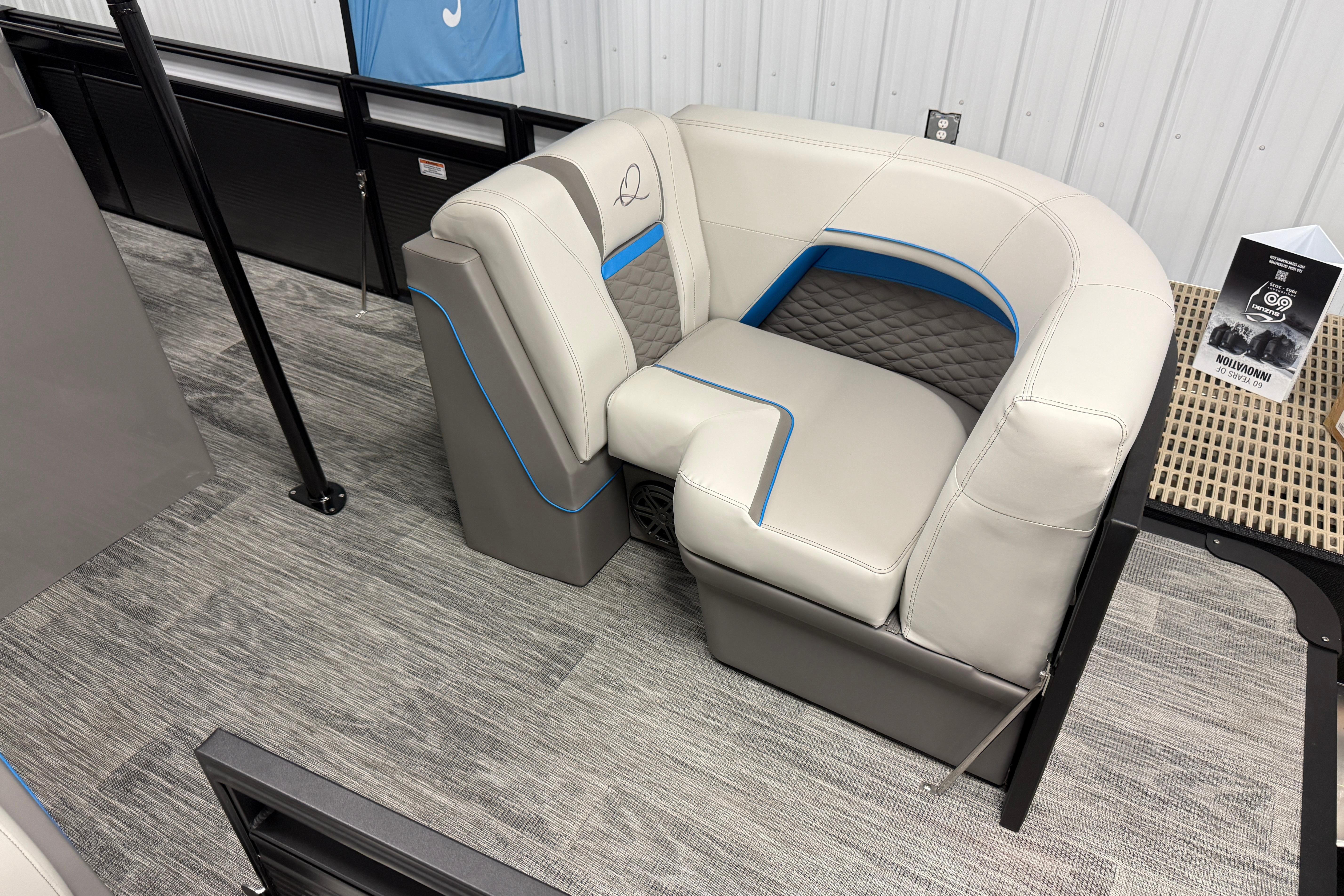 Luxurious seating in 2026 Qwest M-Class 22 Pro Sport boat, featuring modern design and comfort.