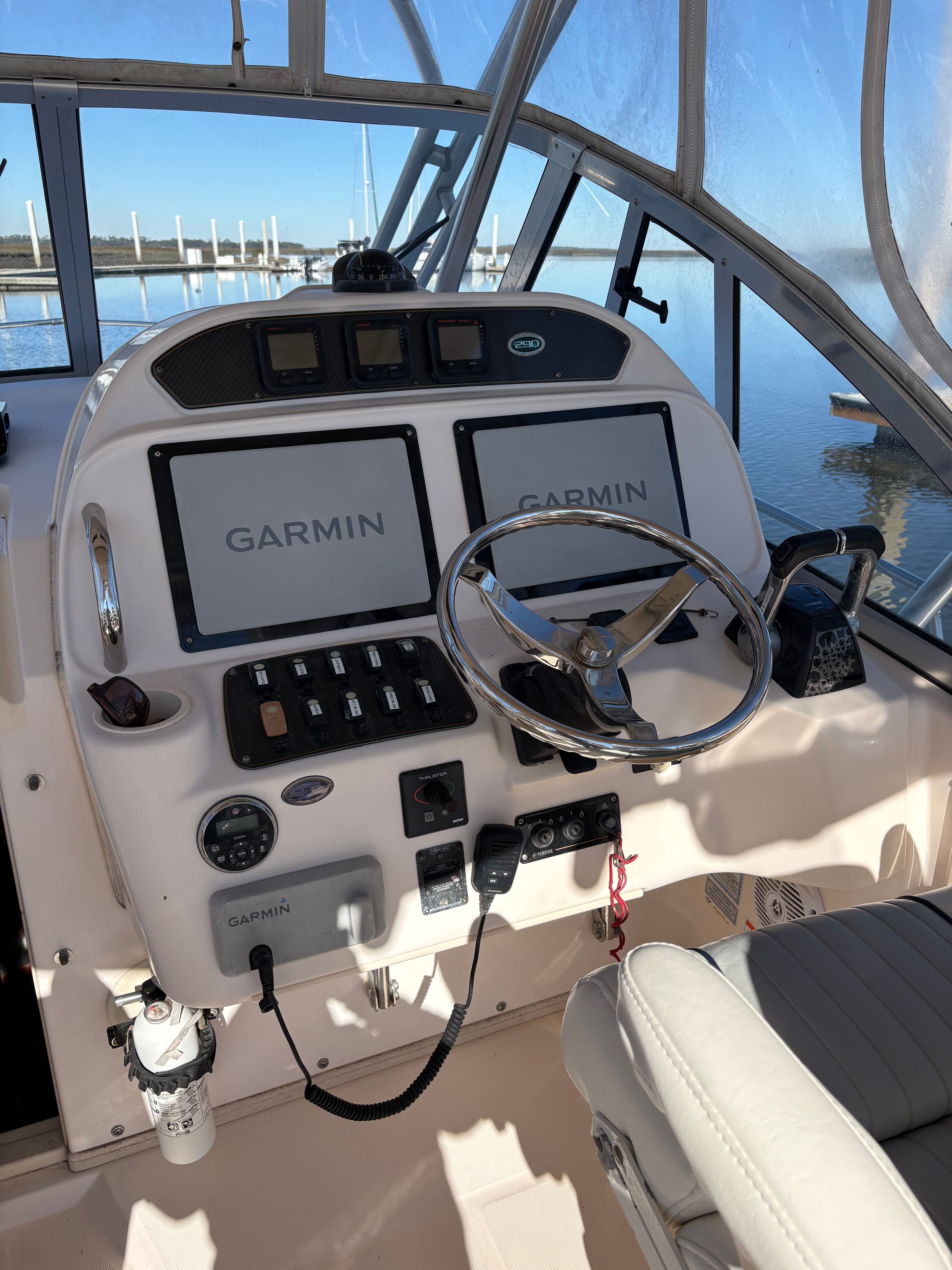 Helm of a 2009 Grady-White Chesapeake 290 with Garmin displays.
