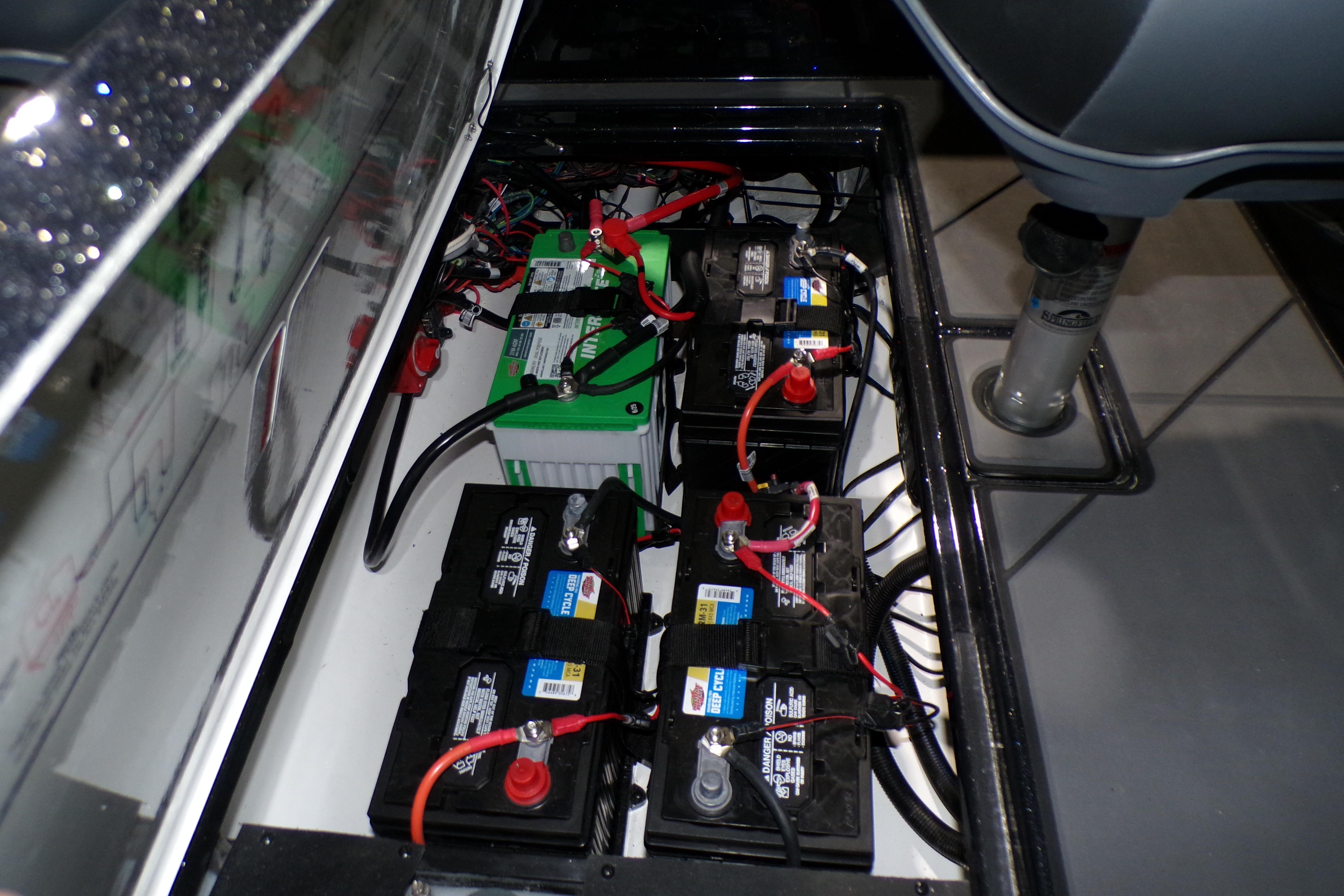 Battery compartment of 2026 Nitro ZV21 Pro, showcasing multiple connected batteries.