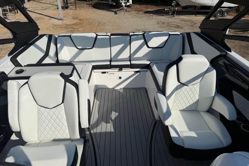 2026 Yamaha Boats 252S interior with luxurious white seating and modern design.