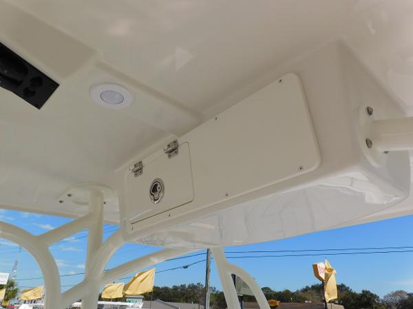 2024 Sailfish 242 CC boat overhead storage compartment.