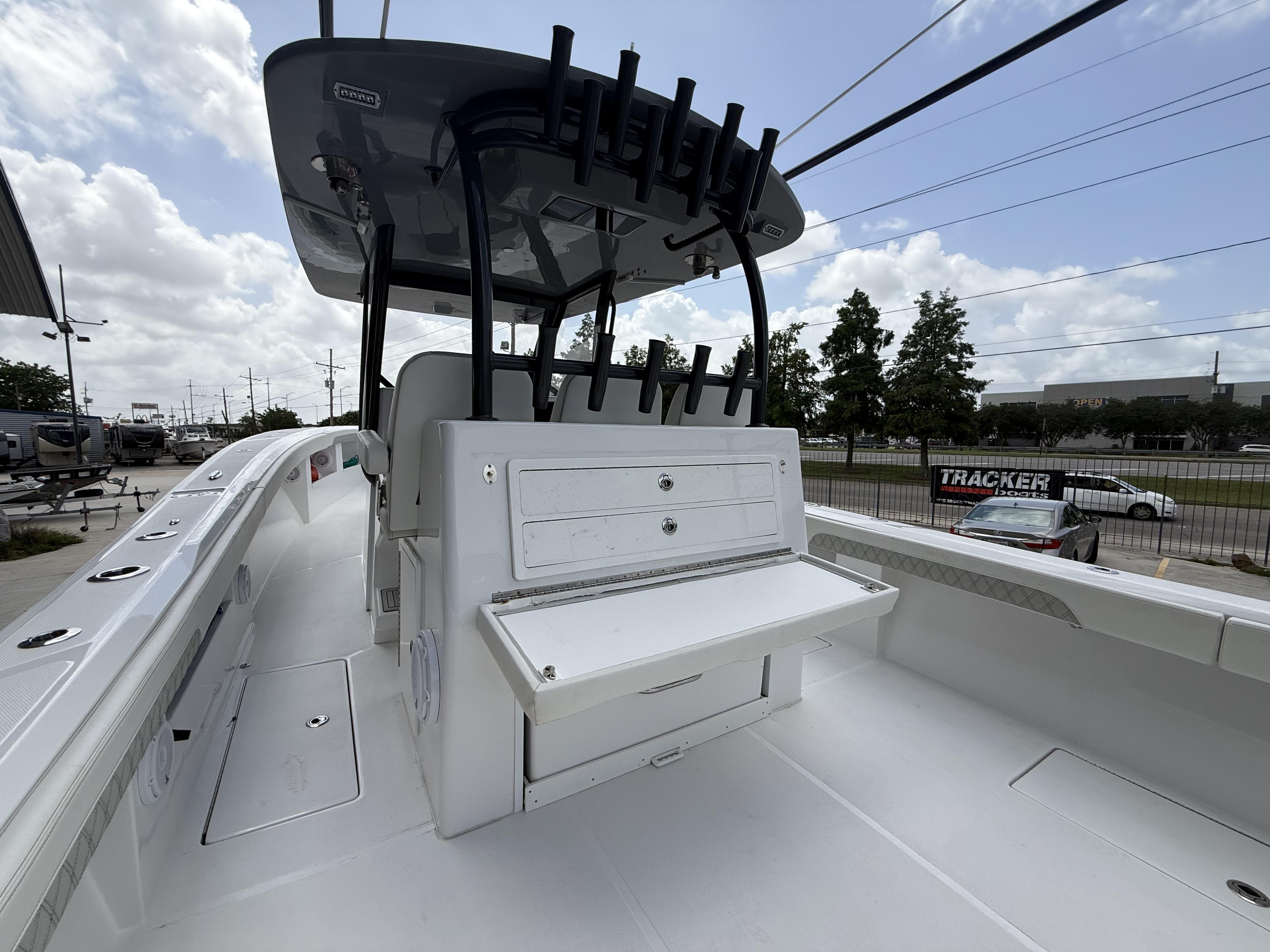 2024 Front Runner 39 CC boat interior with rod holders and storage compartments.