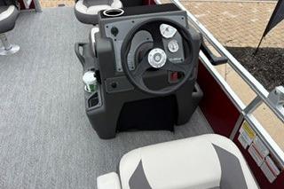 2026 Sun Tracker Bass Buggy 18 DLX boat interior with steering console and seating.