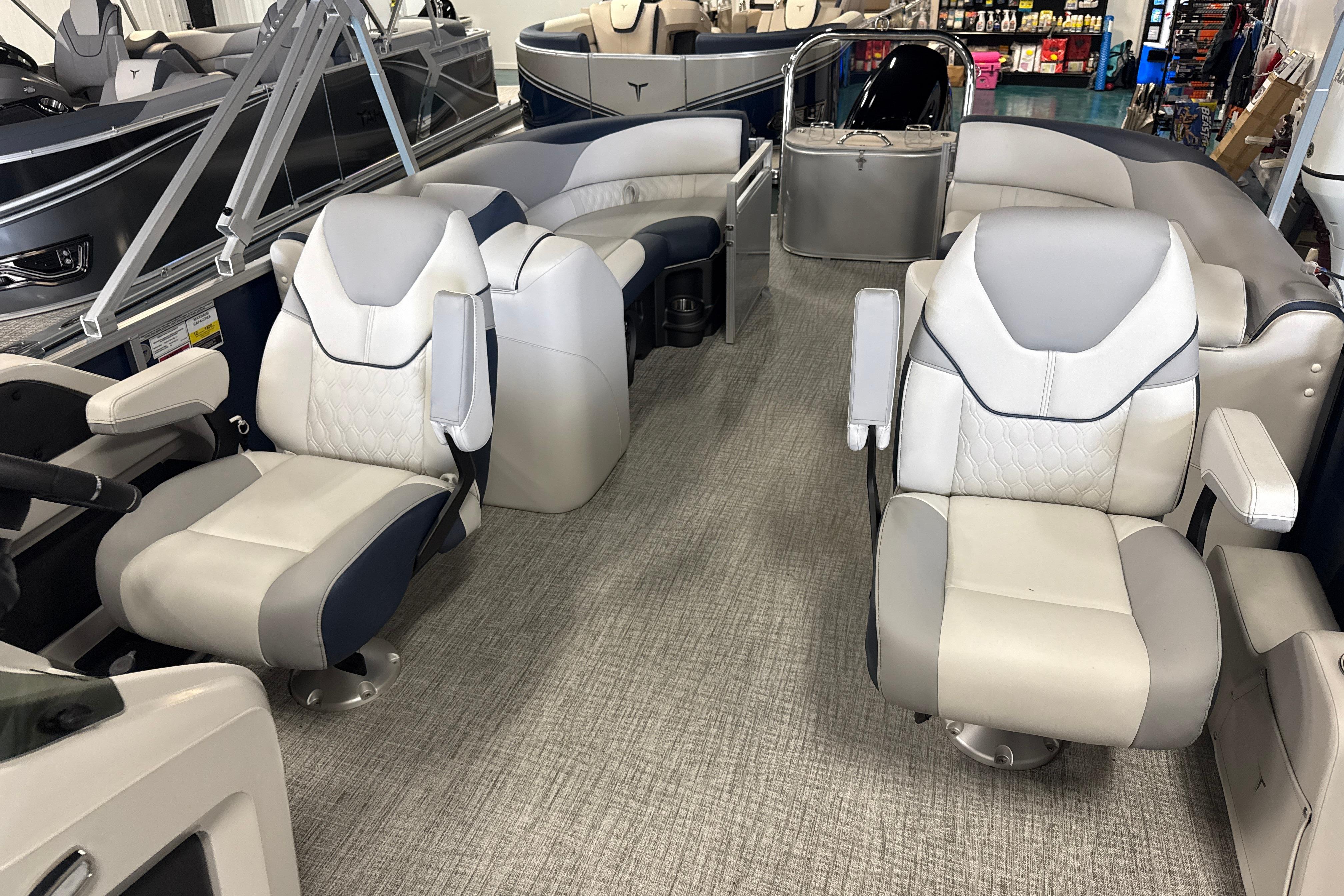 2026 Tahoe Pontoon LTZ Quad Lounger interior with luxurious seating and modern design.
