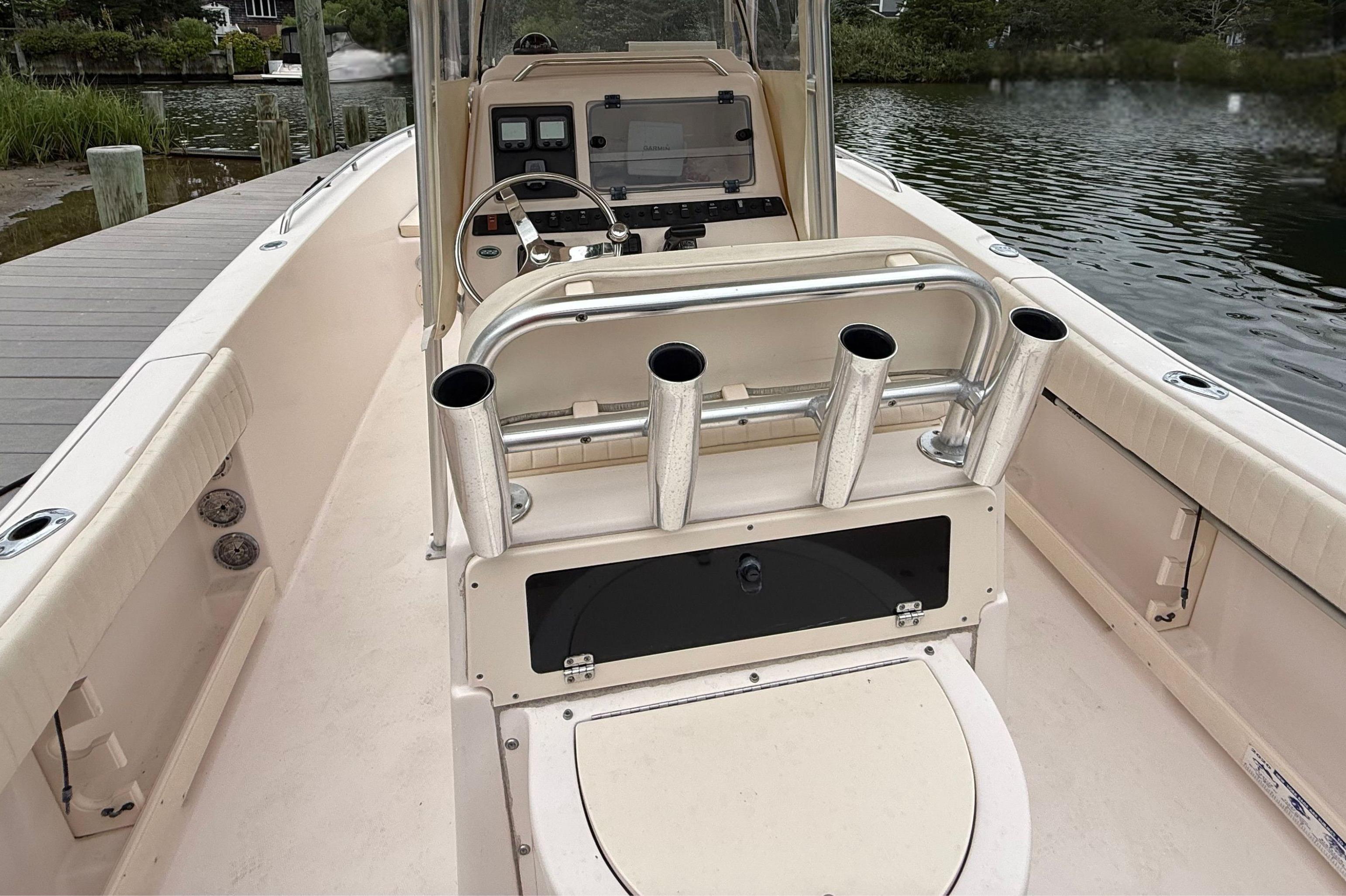 2008 Grady-White Fisherman 222 boat interior with rod holders and steering console.